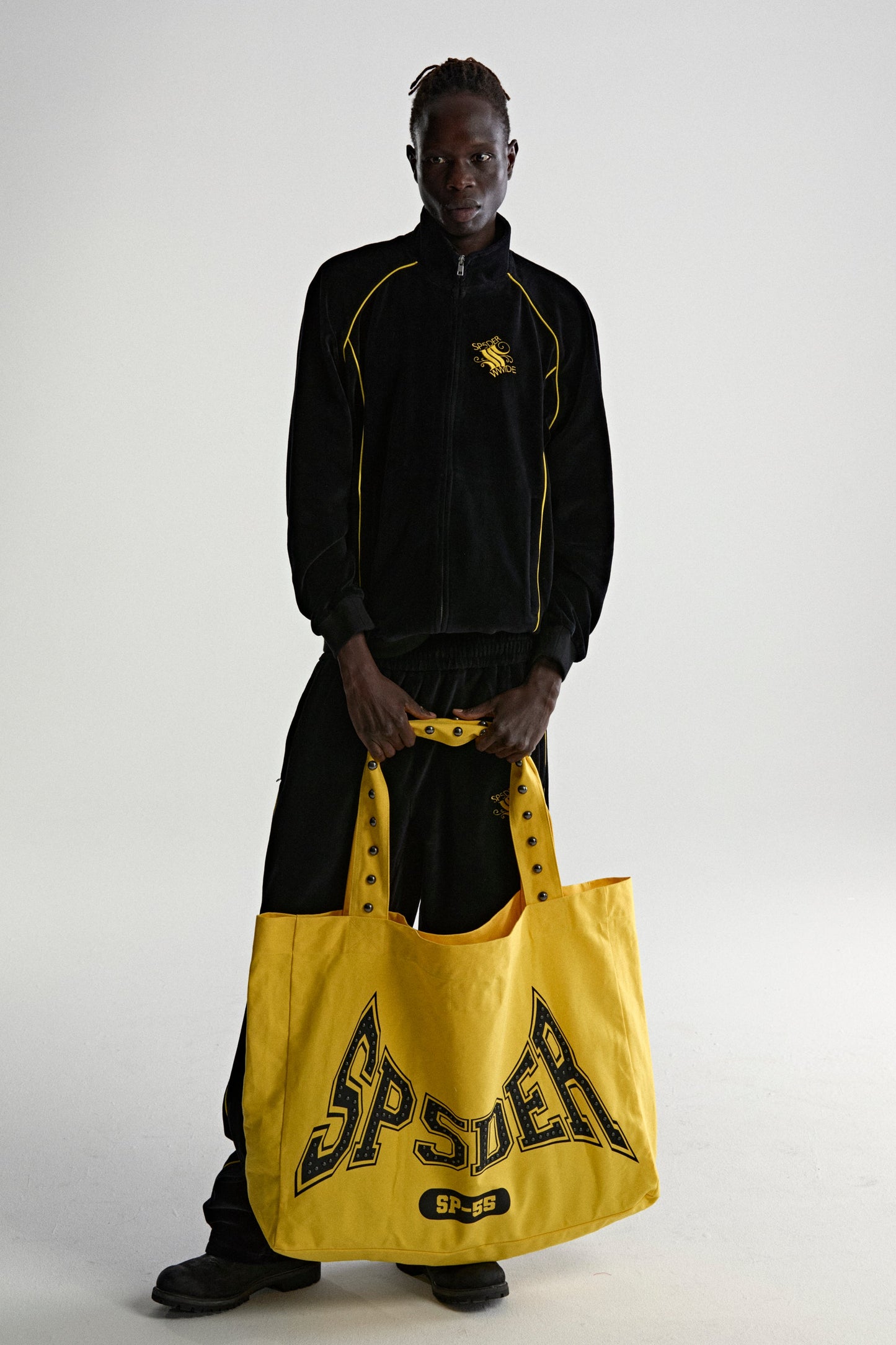 YELLOW T&F STUDDED TOTE ON MODEL