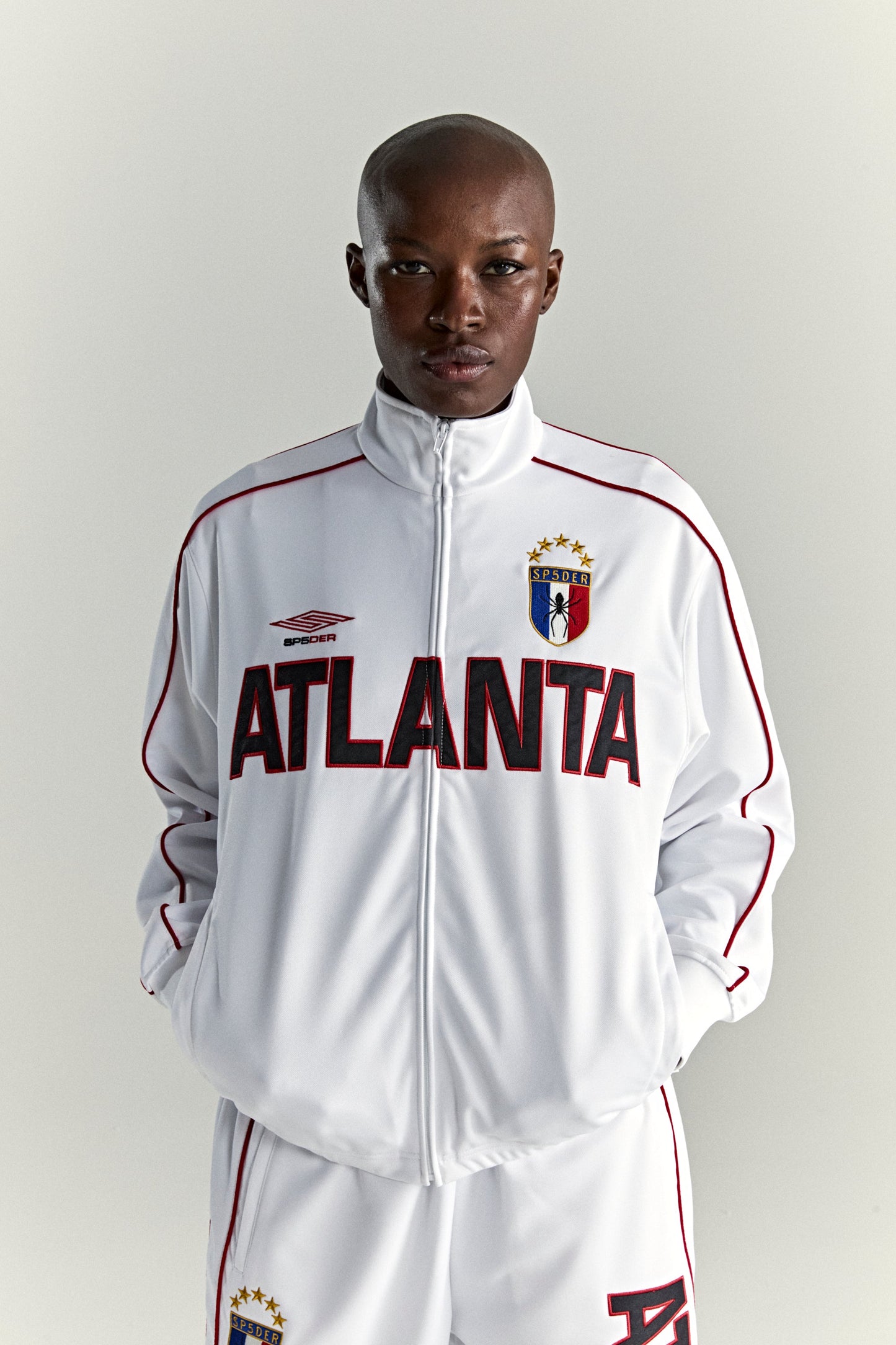 WHITE ATLANTA TRACK JACKET ON MODEL