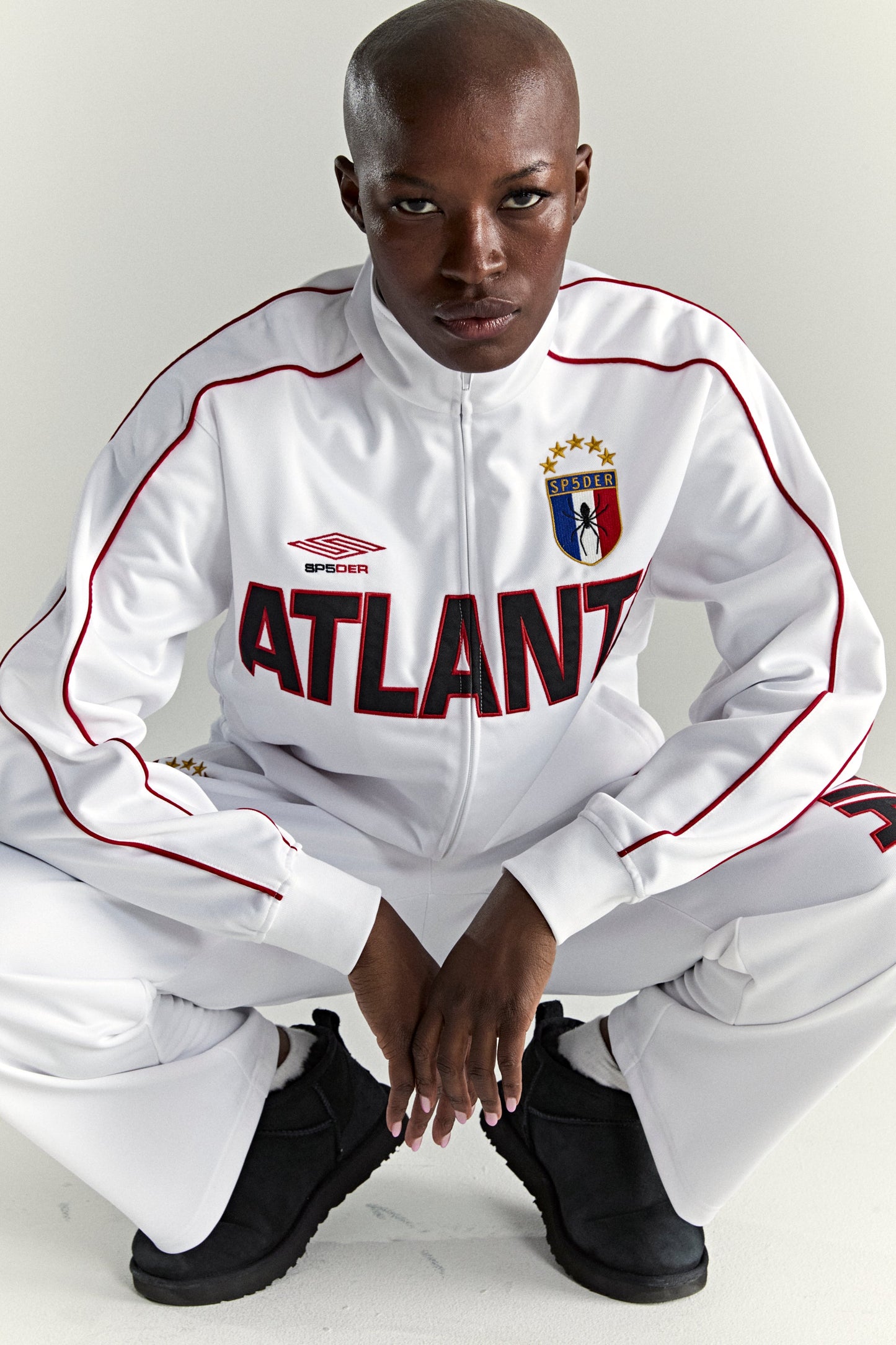 WHITE ATLANTA TRACK JACKET ON MODEL