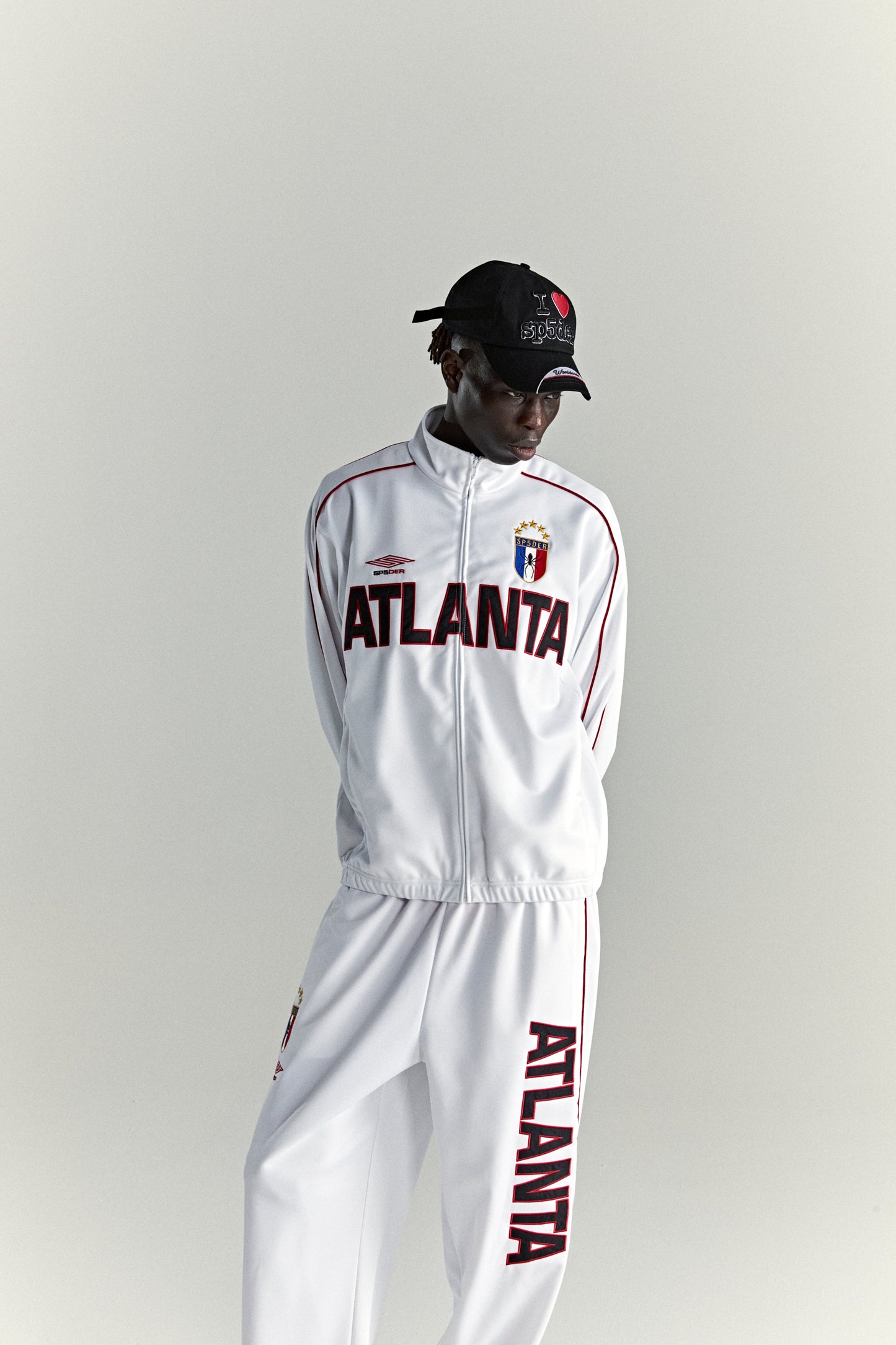 WHITE ATLANTA TRACK JACKET ON MODEL