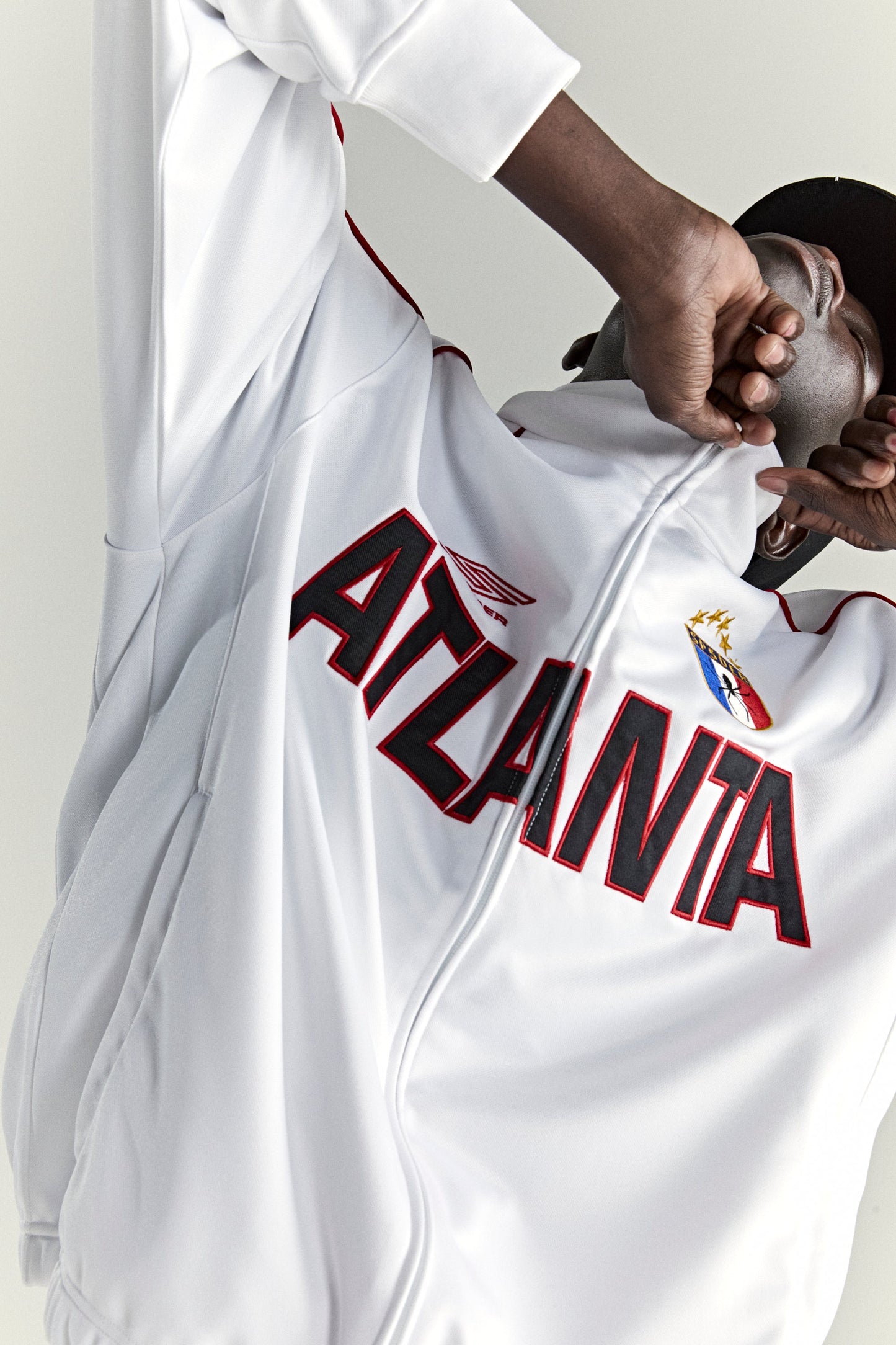 WHITE ATLANTA TRACK JACKET ON MODEL