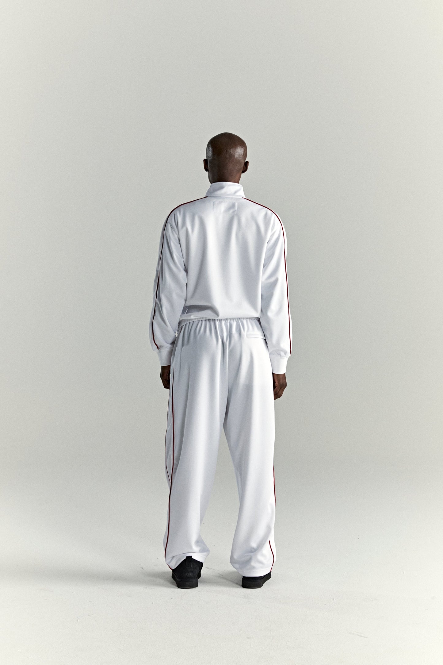 WHITE ATLANTA TRACK JACKET ON MODEL