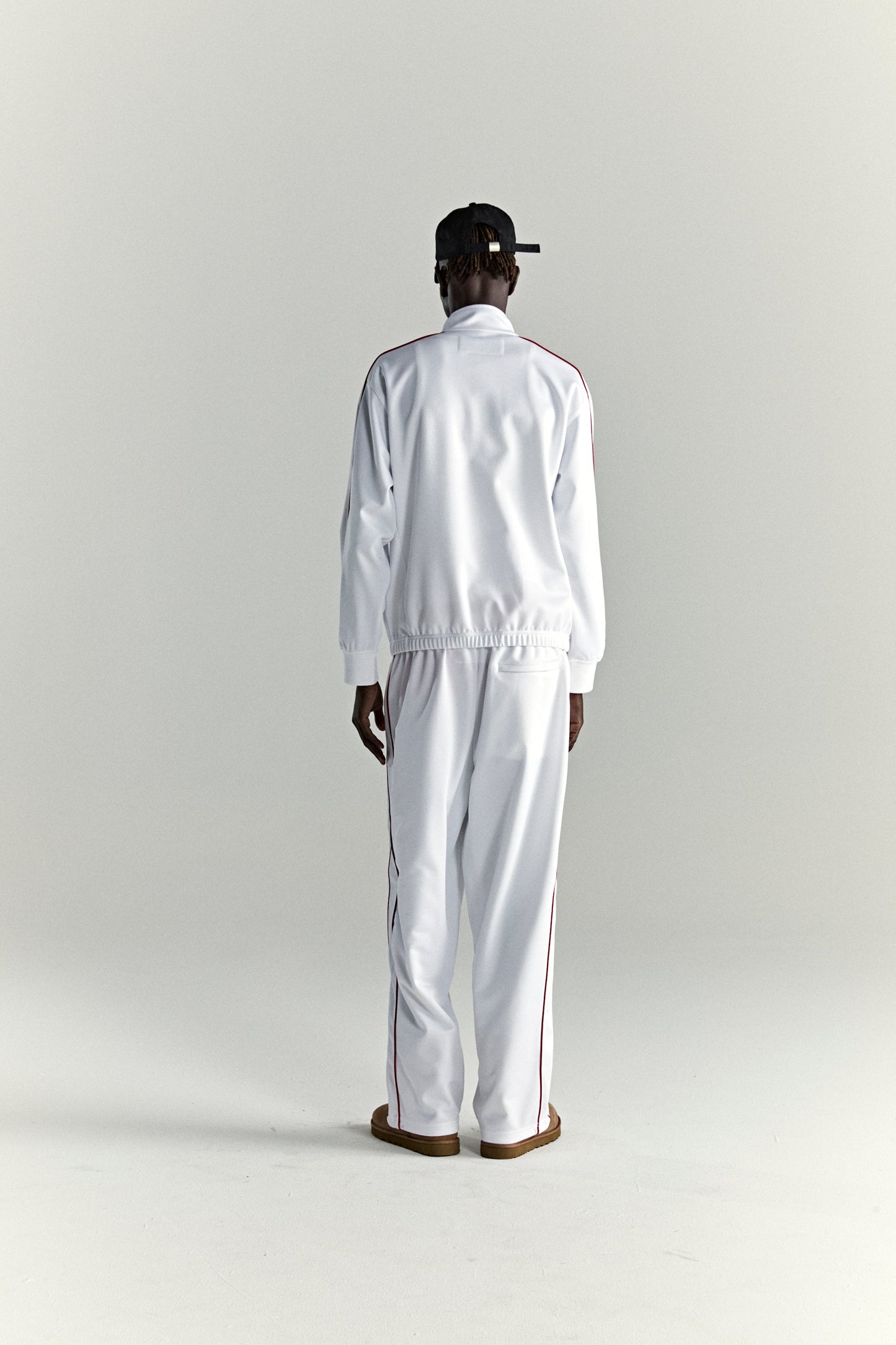 WHITE ATLANTA TRACK JACKET ON MODEL