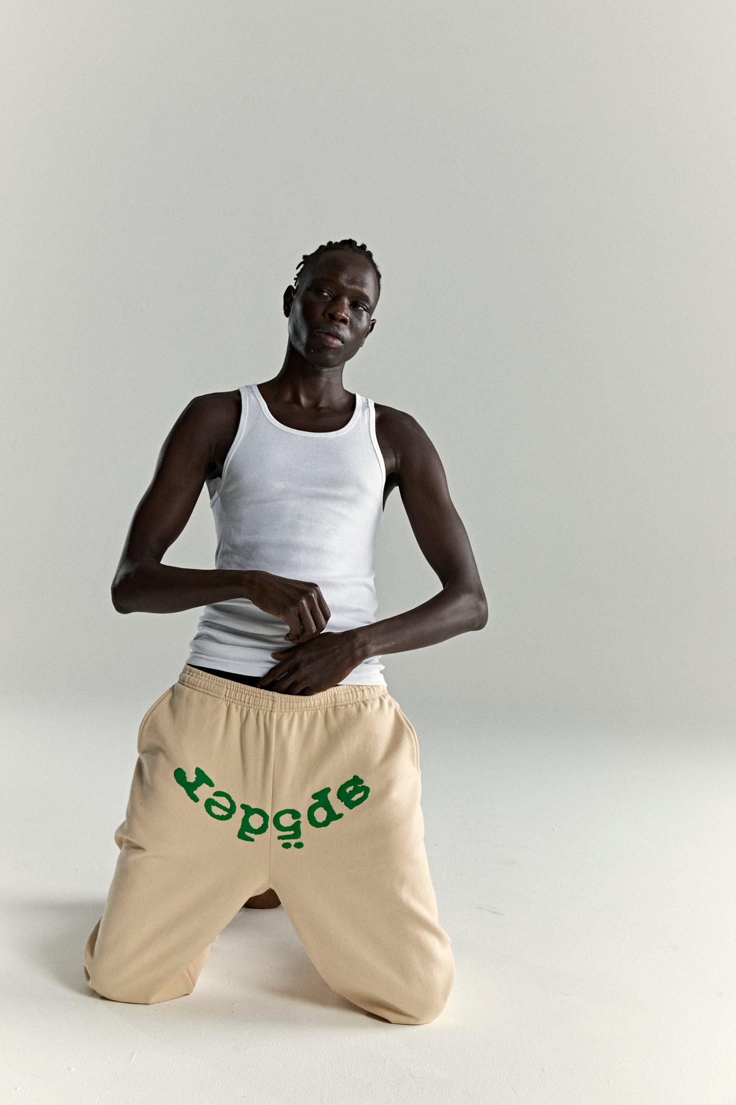 CREAM OG WEB V2 SWEATPANT ON MODEL