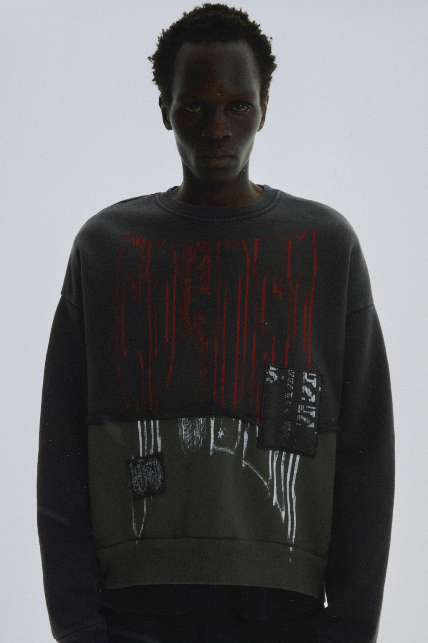 BLACK DIFFUSED COLLEGIATE CREWNECK ON MODEL