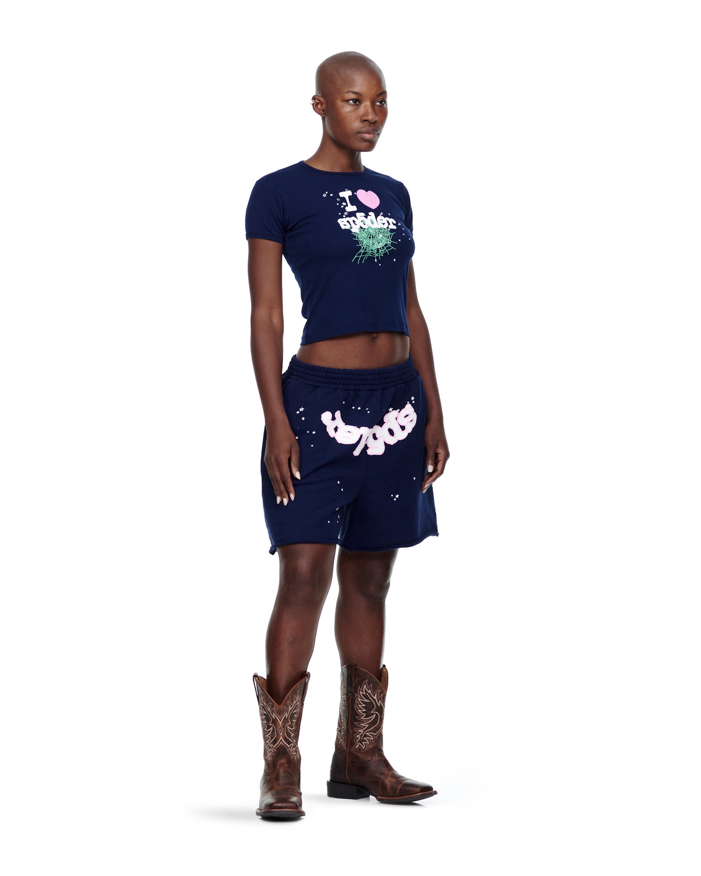 Female model in navy 100% cotton cropped baby tee with "I heart Bitch" graphic and matching shorts.