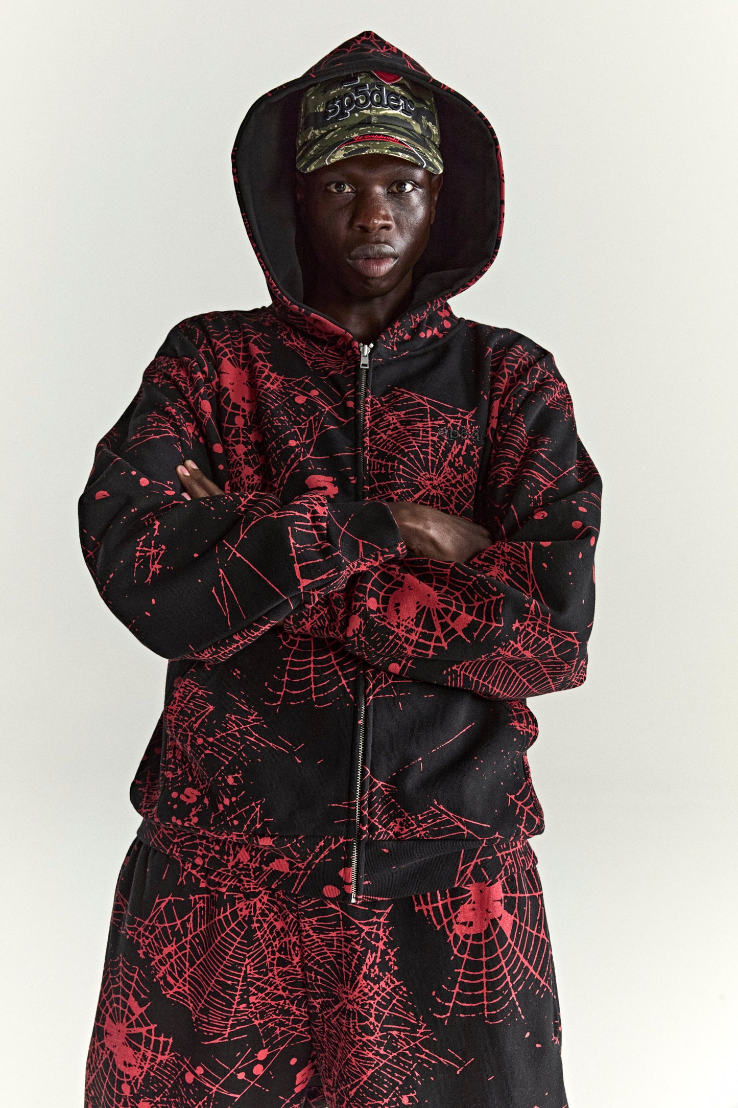 BLACK AOP WEB ZIP UP V2 HOODIE ON MODEL