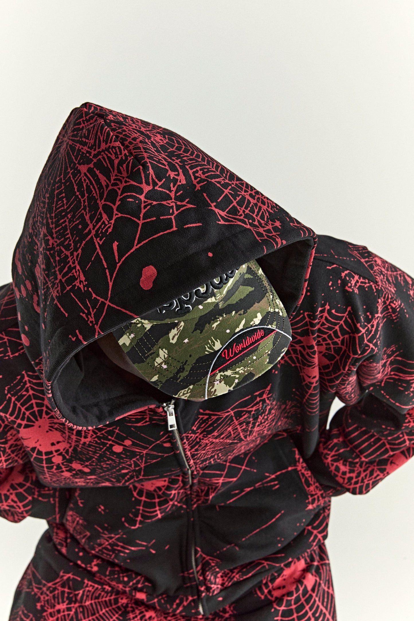 BLACK AOP WEB ZIP UP V2 HOODIE ON MODEL