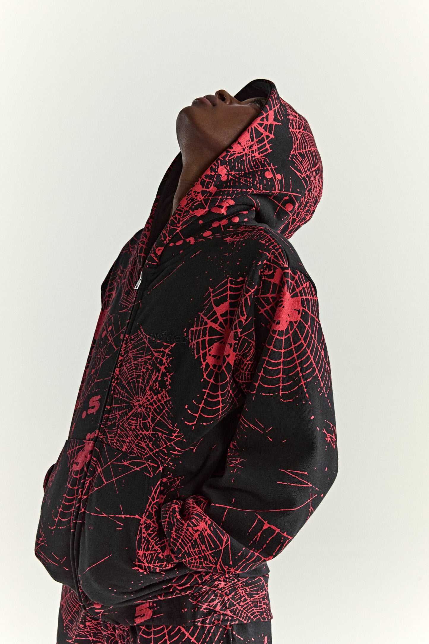 BLACK AOP WEB ZIP UP V2 HOODIE ON MODEL