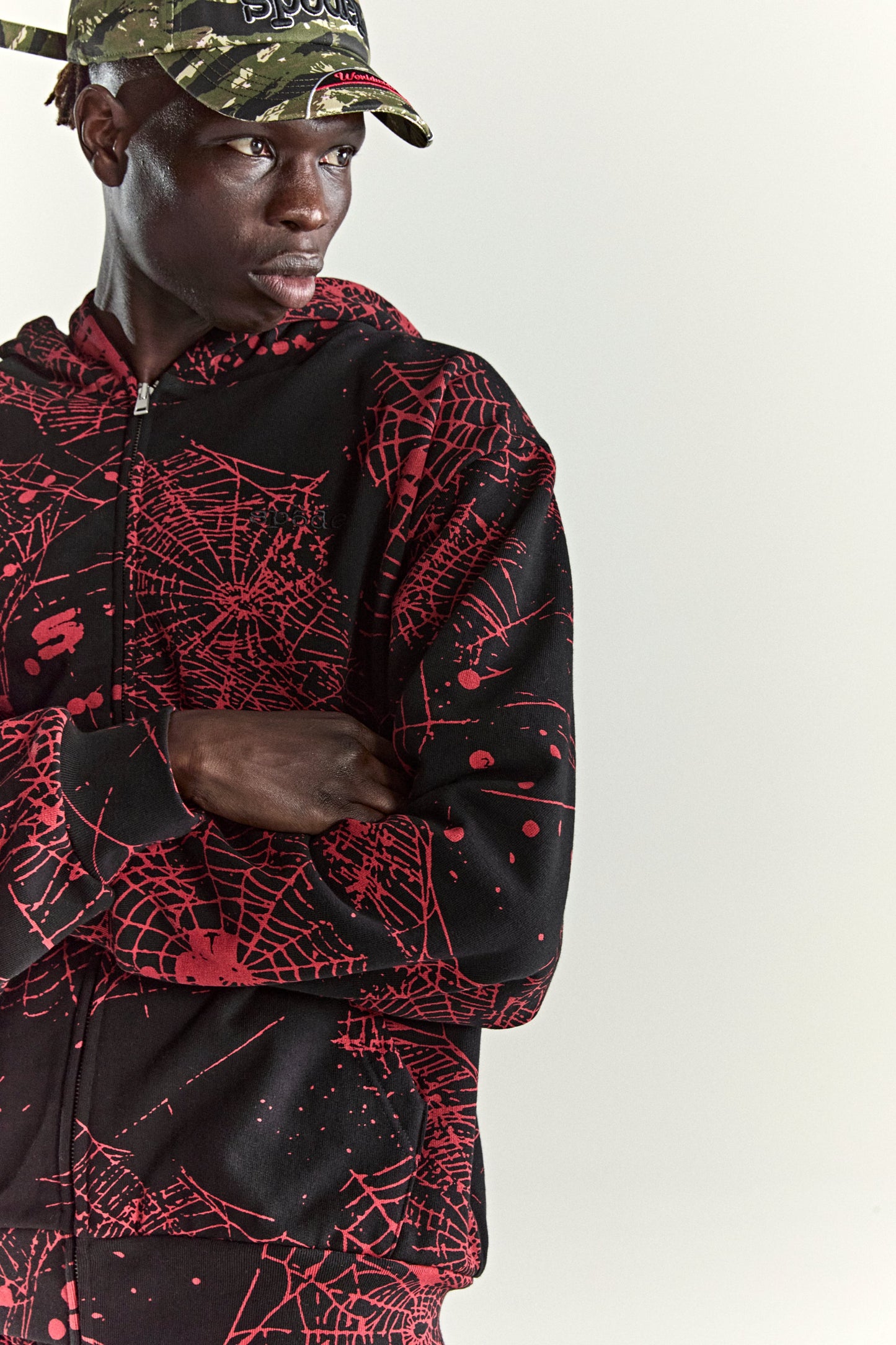 BLACK AOP WEB ZIP UP V2 HOODIE ON MODEL
