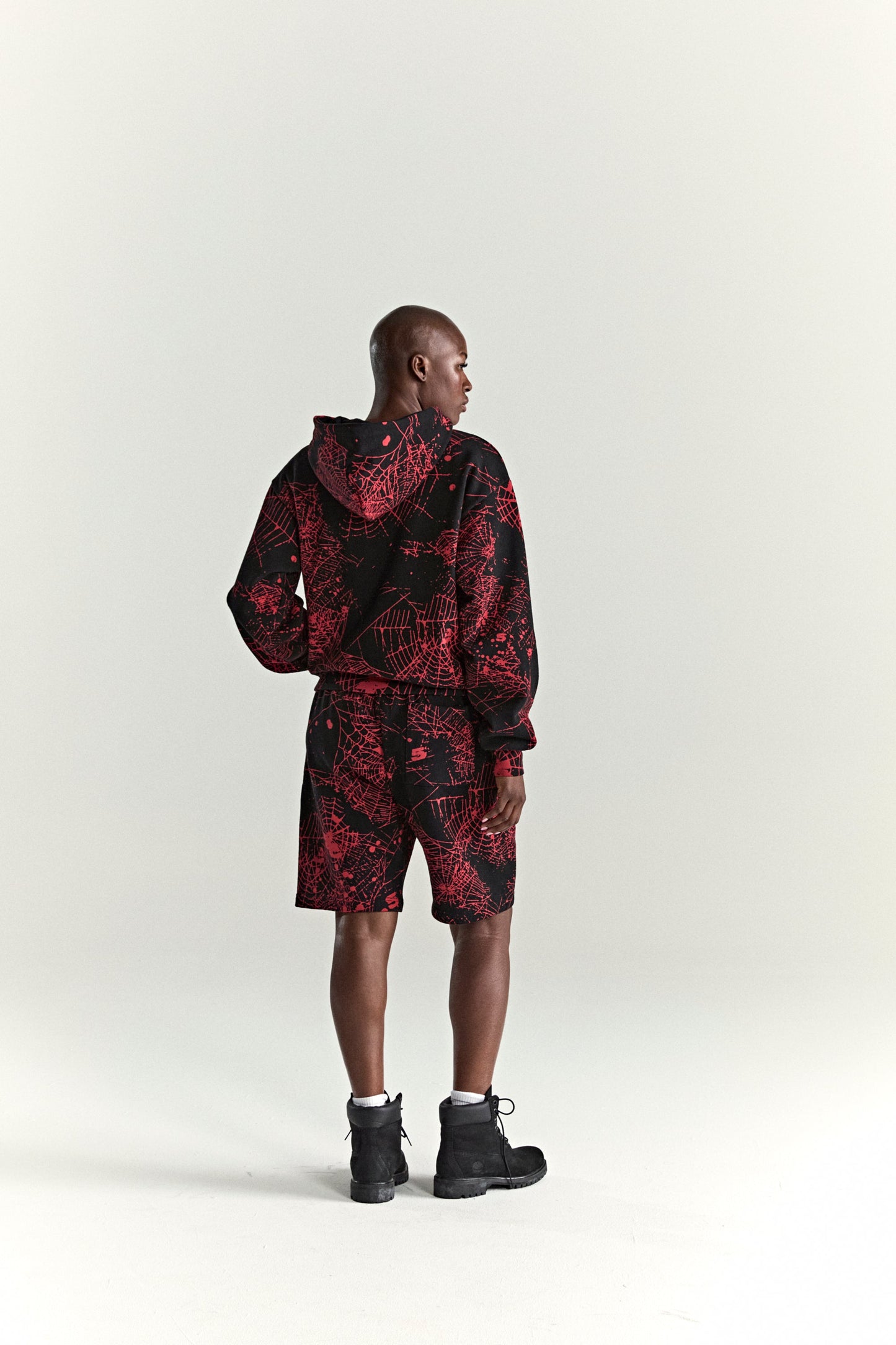 BLACK AOP WEB ZIP UP V2 HOODIE ON MODEL