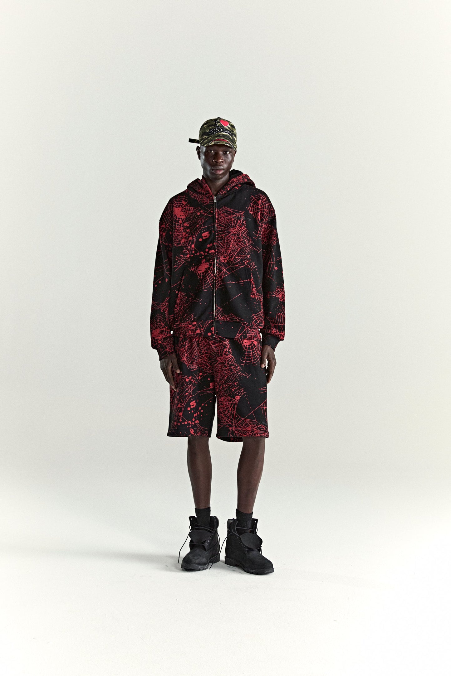 BLACK AOP WEB ZIP UP V2 HOODIE ON MODEL