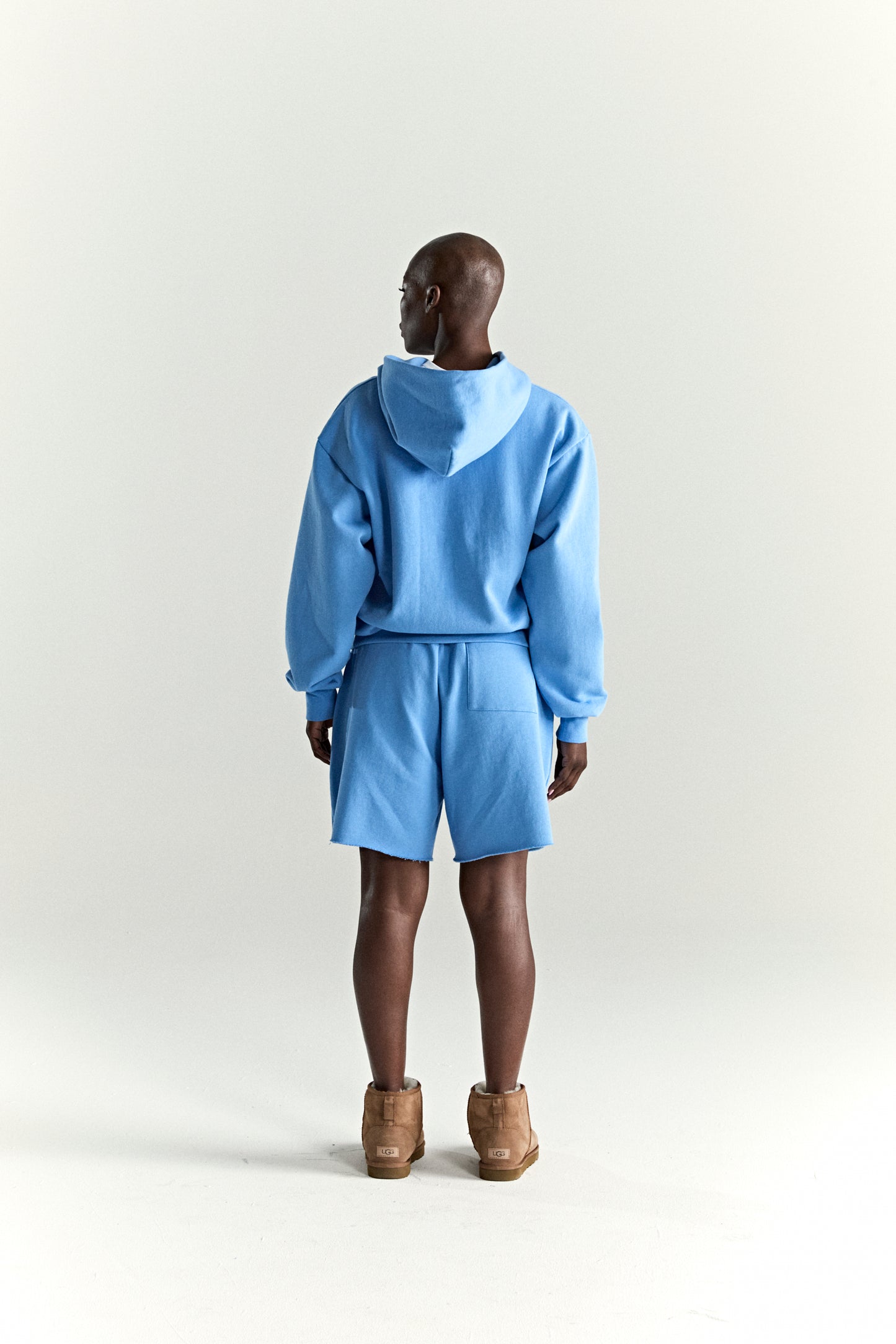 DUSTY BLUE OG WEB V2 HOODIE ON MODEL