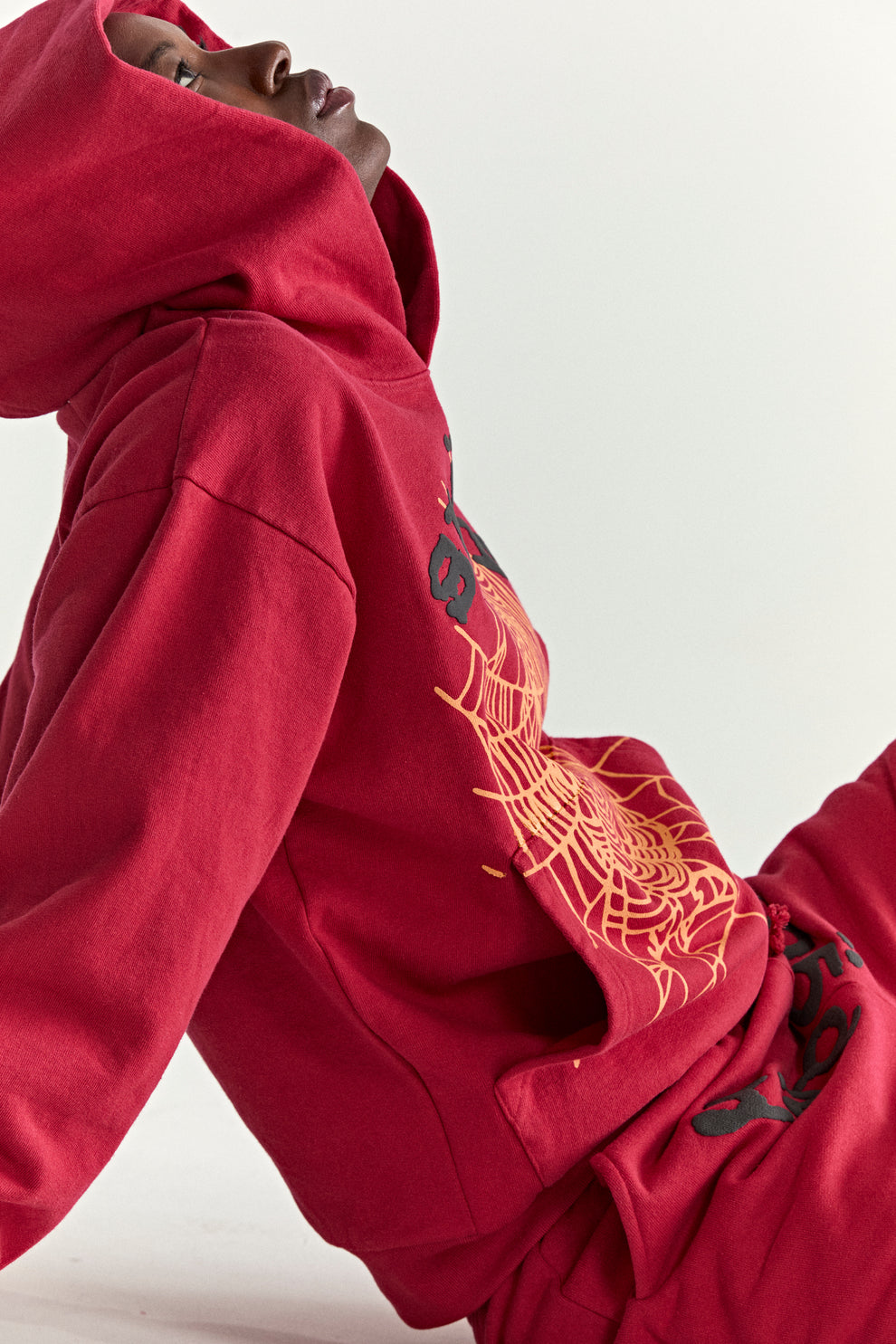 RED OG WEB V2 HOODIE ON MODEL