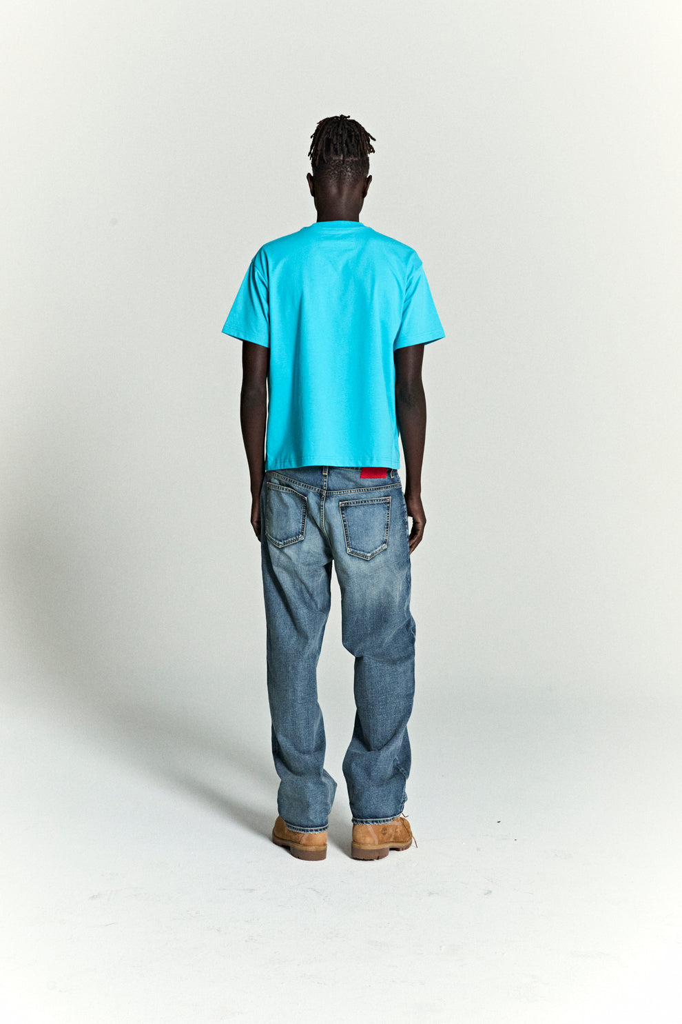 CYAN OG WEB V2 TEE ON MODEL