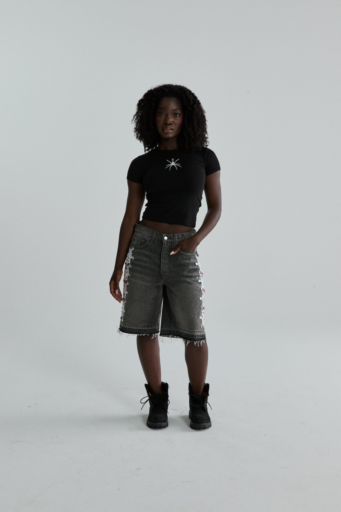 BLACK TM BABY TEE ON MODEL