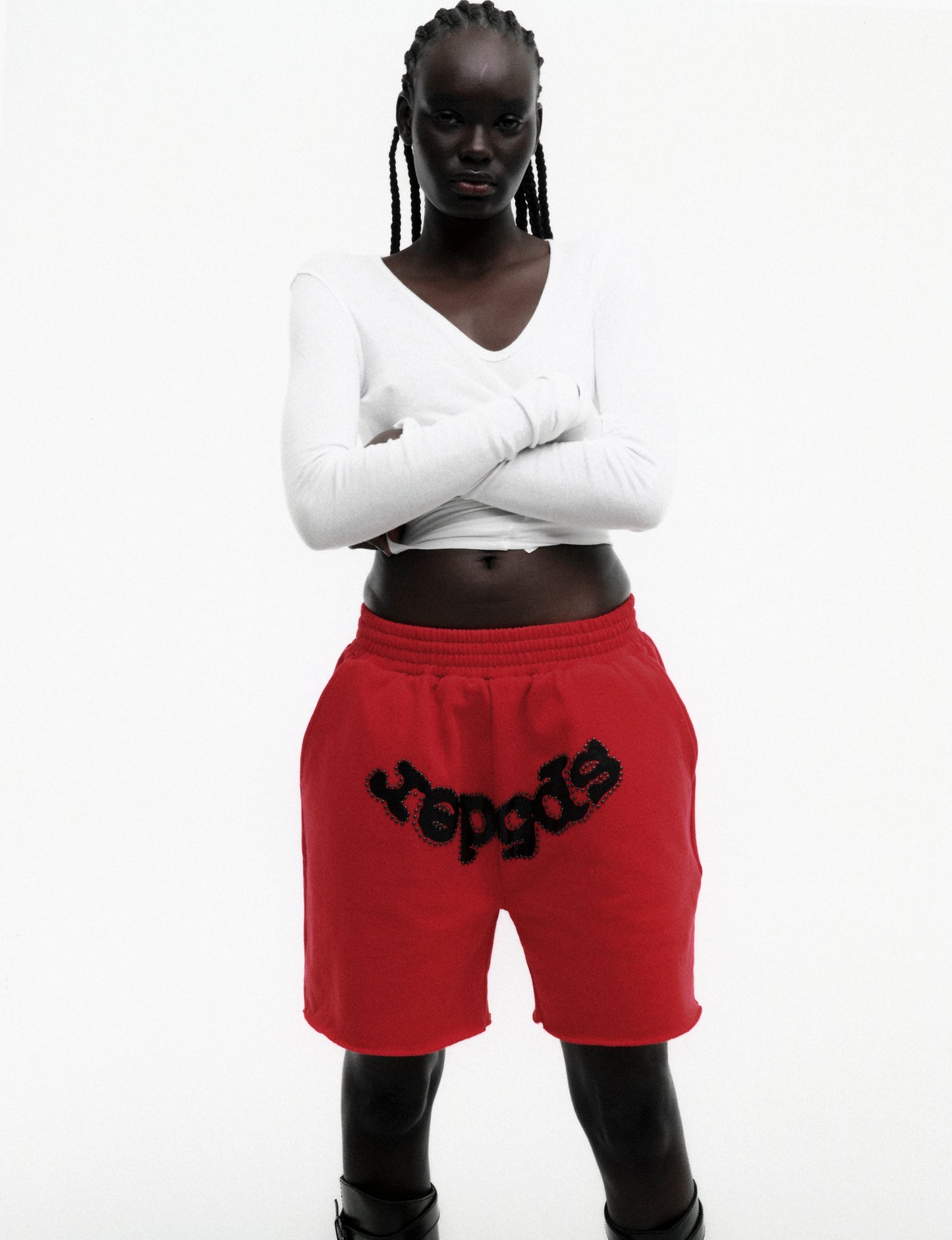 RED OG STUDDED SWEATSHORT ON MODEL