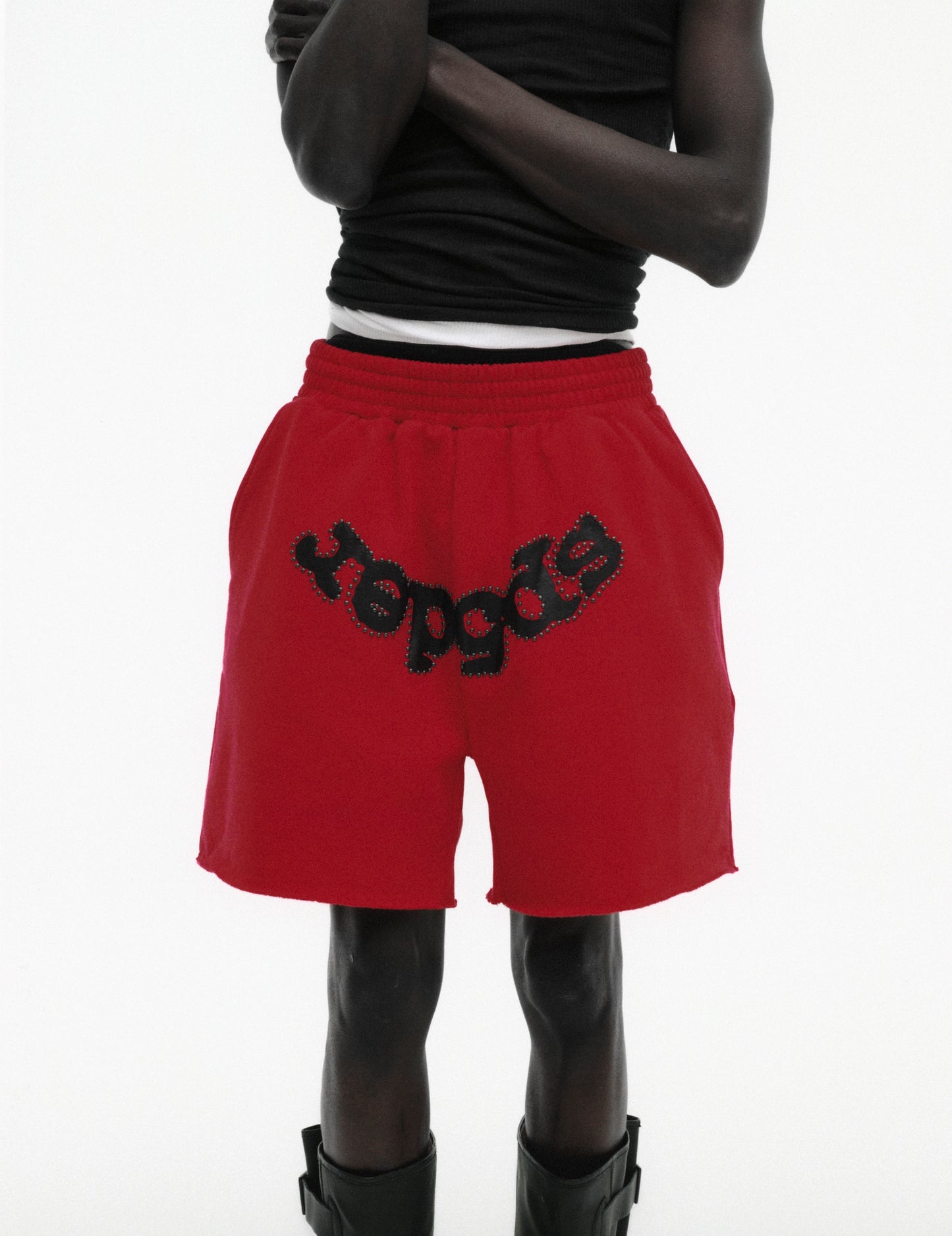 RED OG STUDDED SWEATSHORT ON MODEL