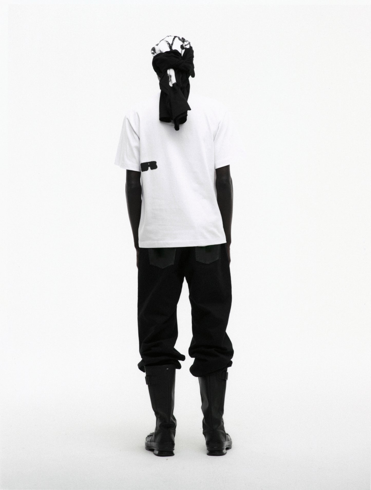 WHITE SPINNER TEE ON MODEL