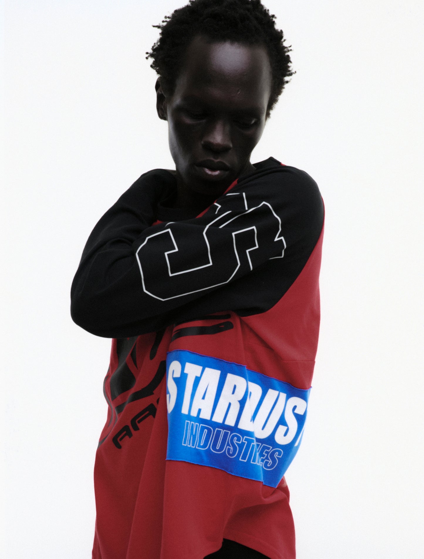 RED RALLY RAGLAN LONGSLEEVE ON MODEL
