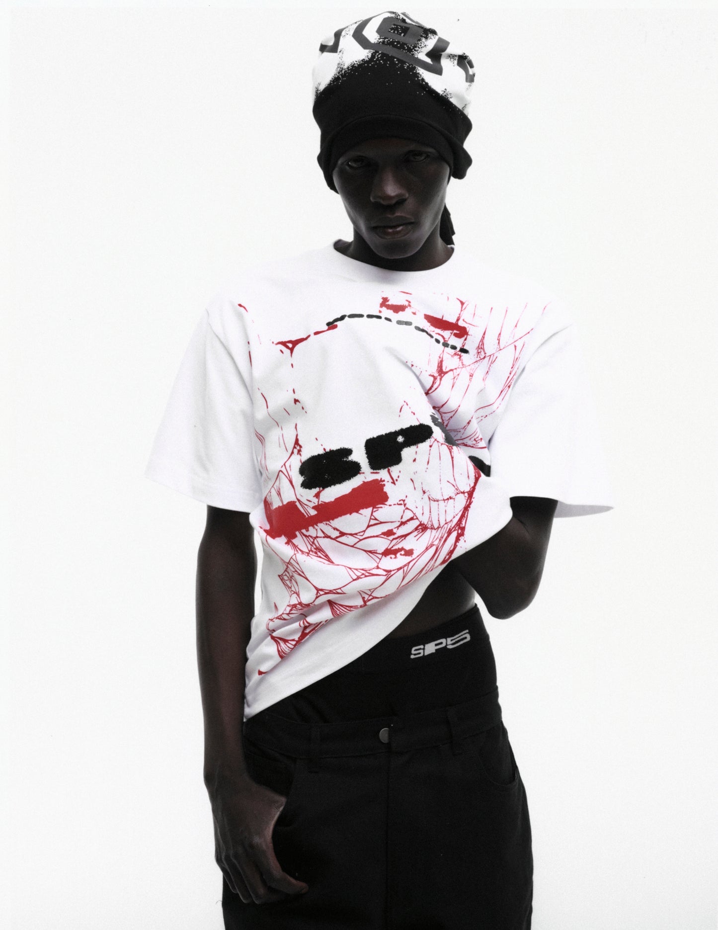 WHITE SPINNER TEE ON MODEL