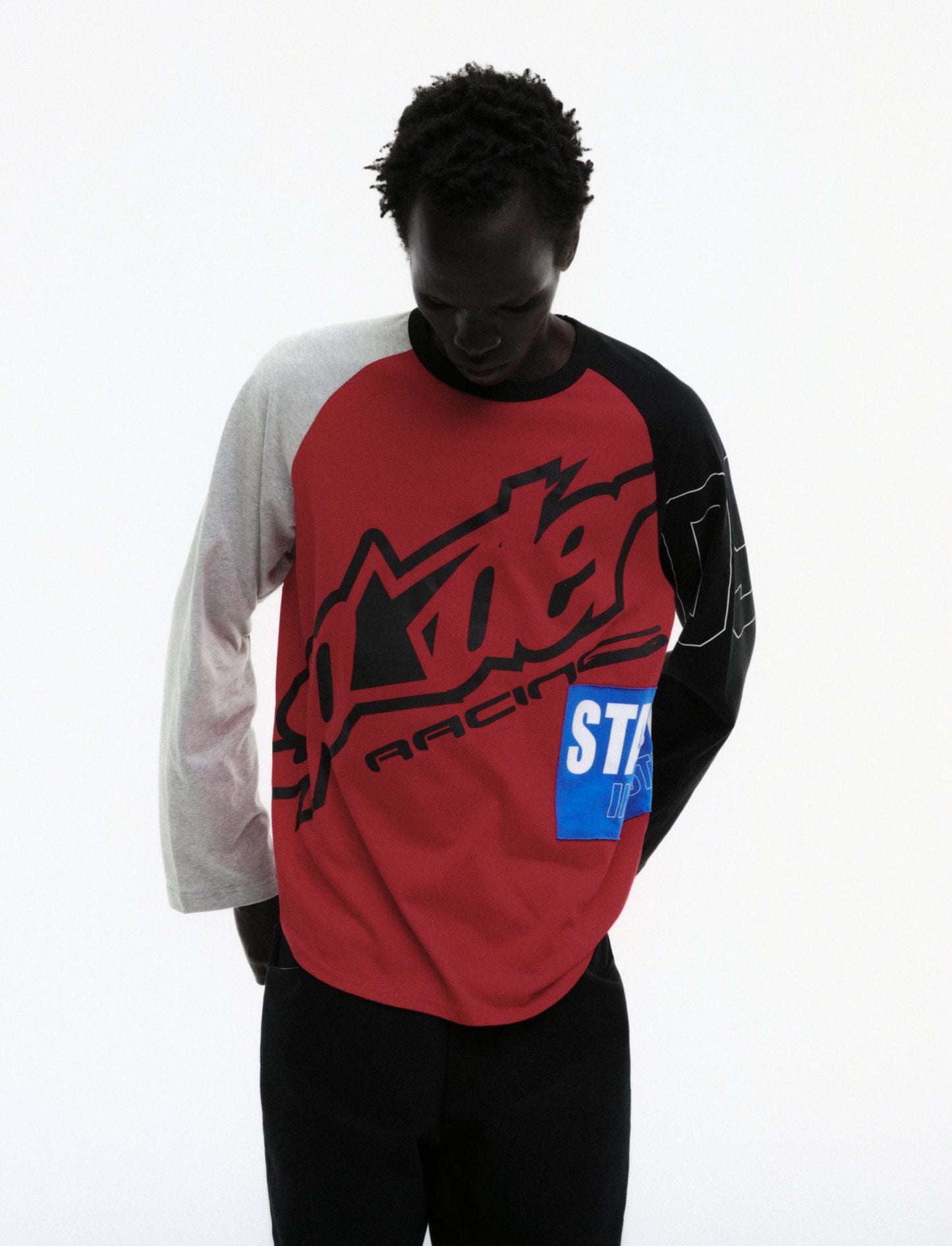 RED RALLY RAGLAN LONGSLEEVE ON MODEL