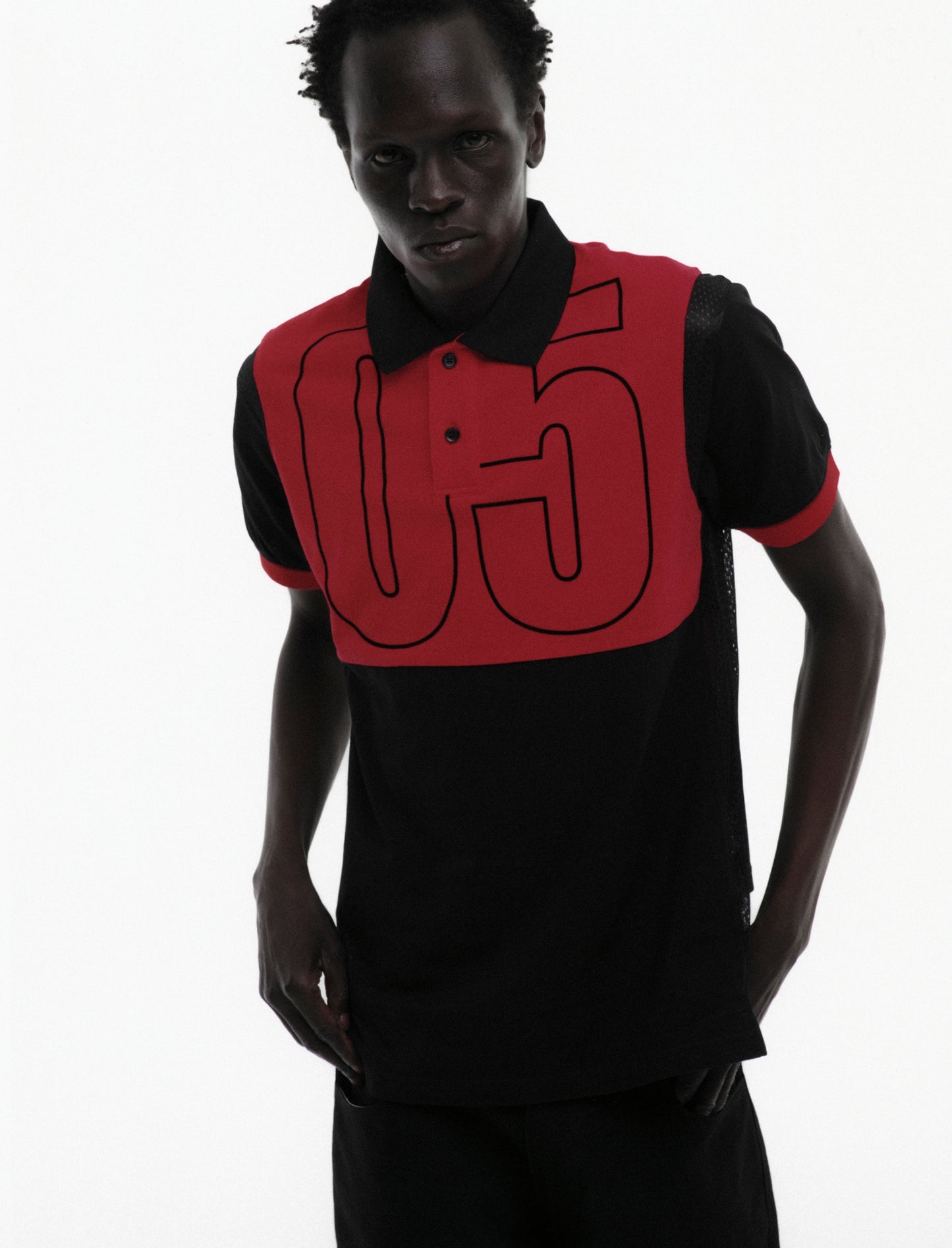 BLACK RECRUIT SS POLO ON MODEL