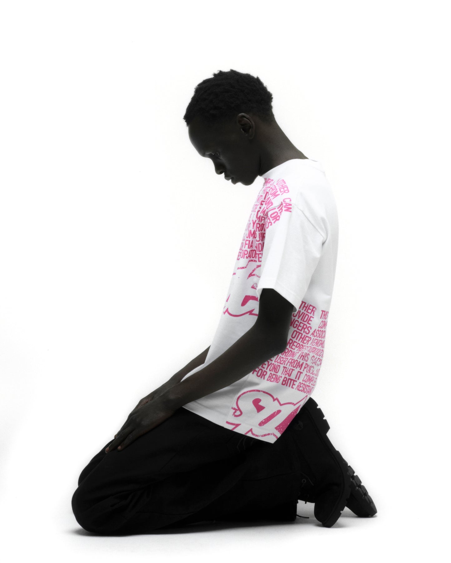 DISCLAIMER TEE ON MODEL