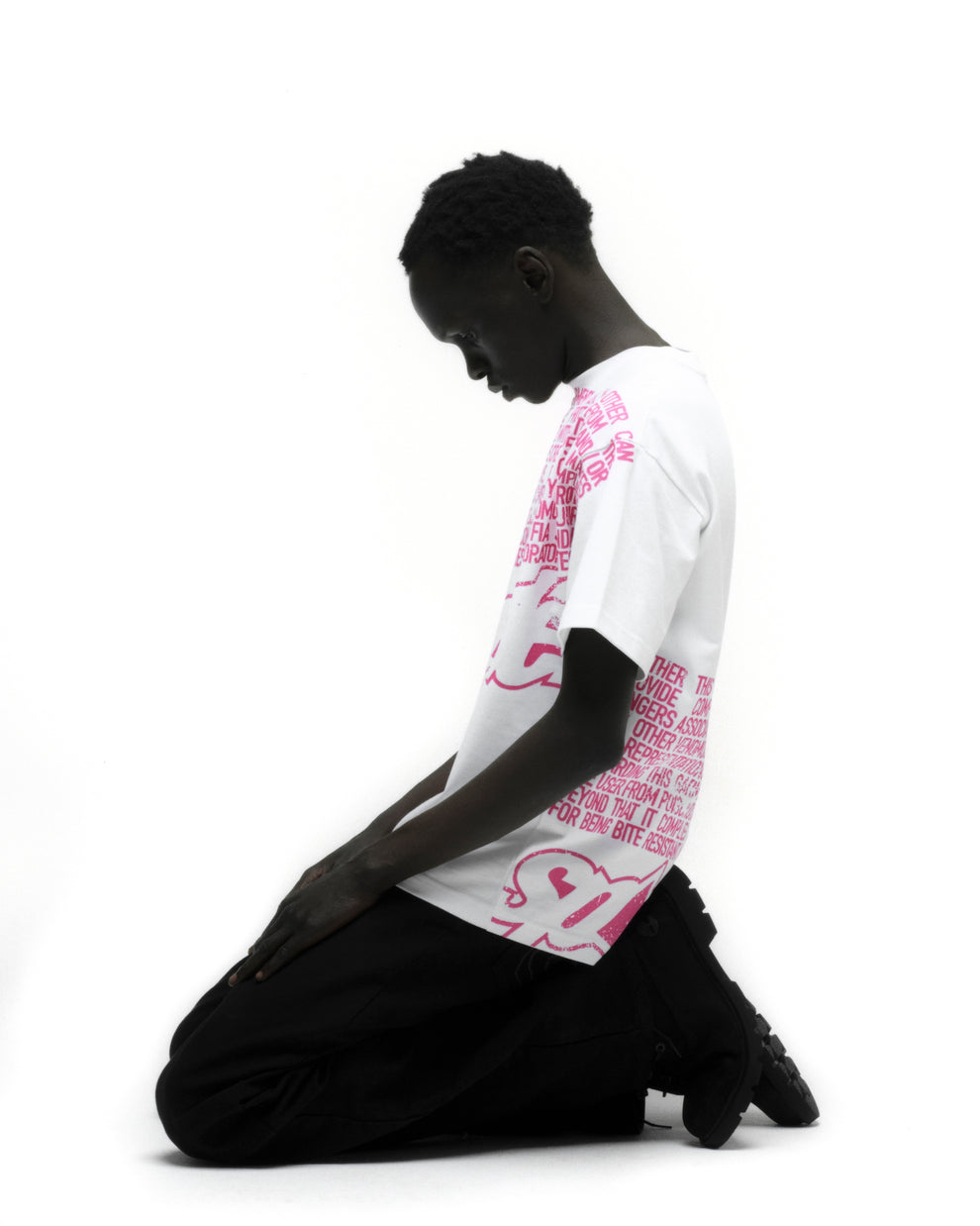 DISCLAIMER TEE ON MODEL