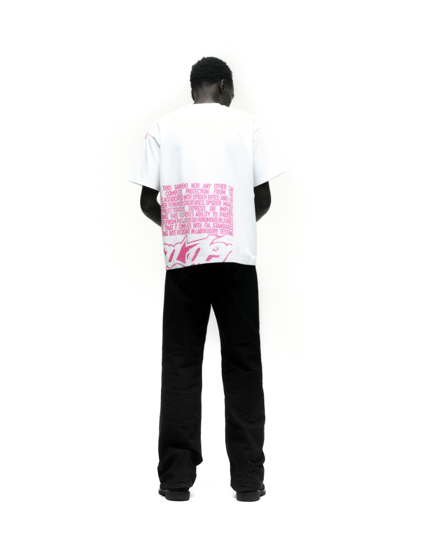 DISCLAIMER TEE ON MODEL