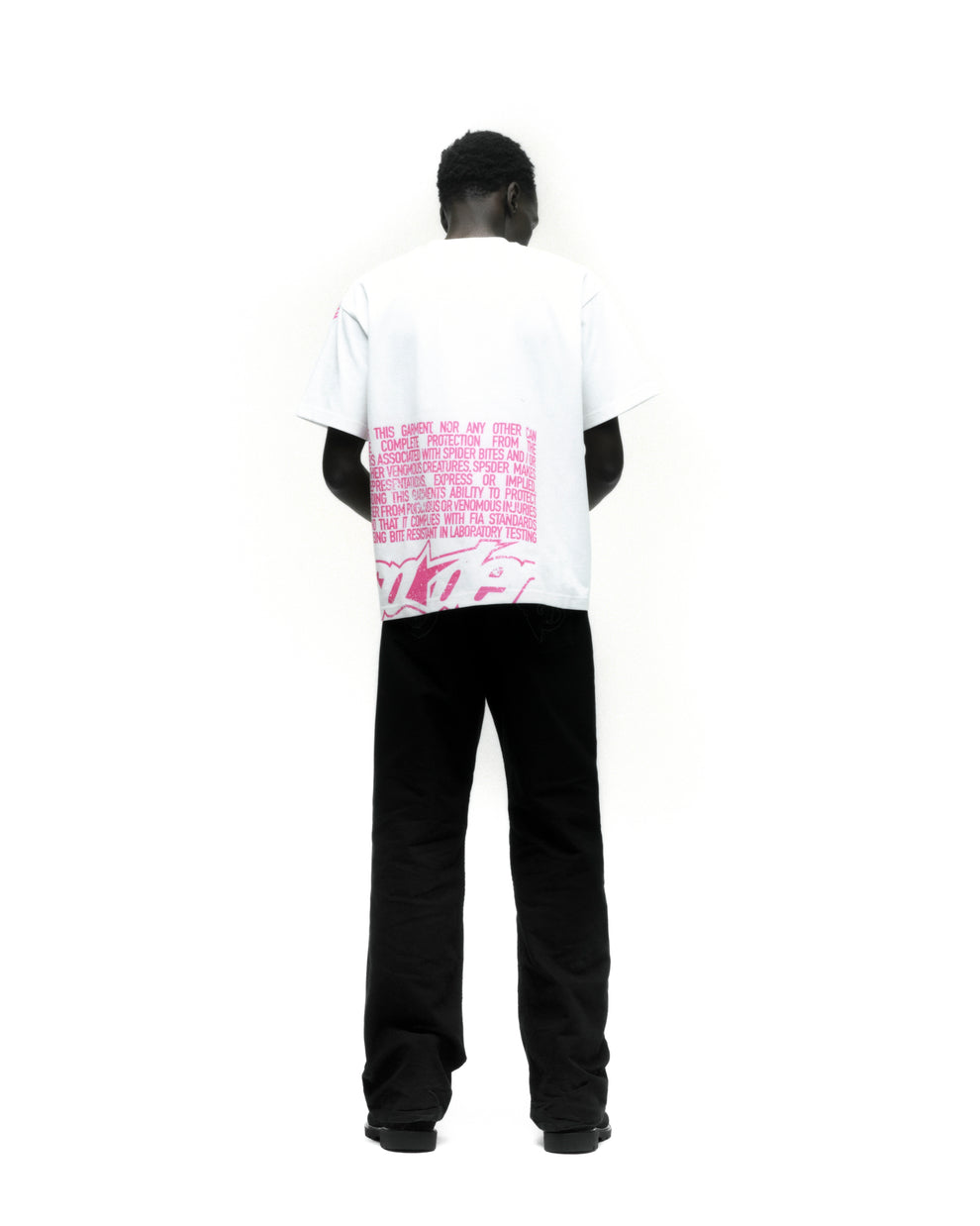 DISCLAIMER TEE ON MODEL