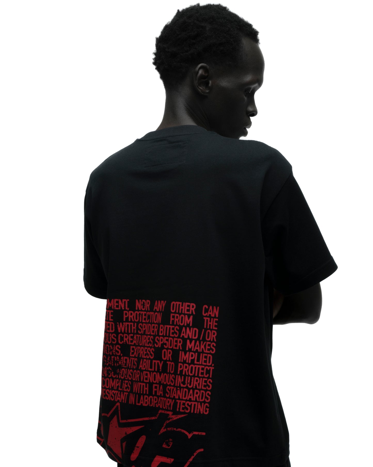 DISCLAIMER TEE ON MODEL