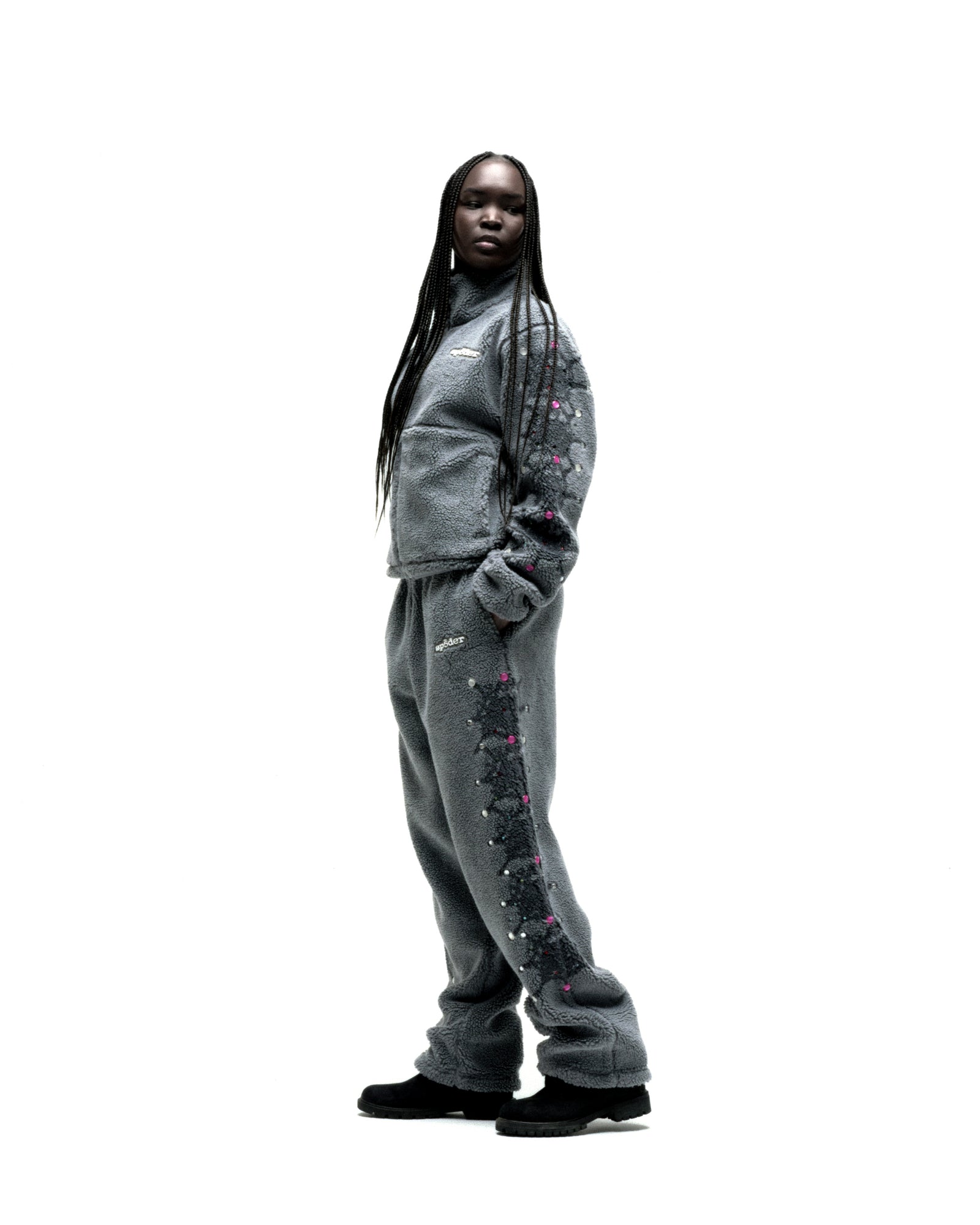 Gray sherpa fleece zip-up jacket and matching pants with web print and rhinestone embellishments.
