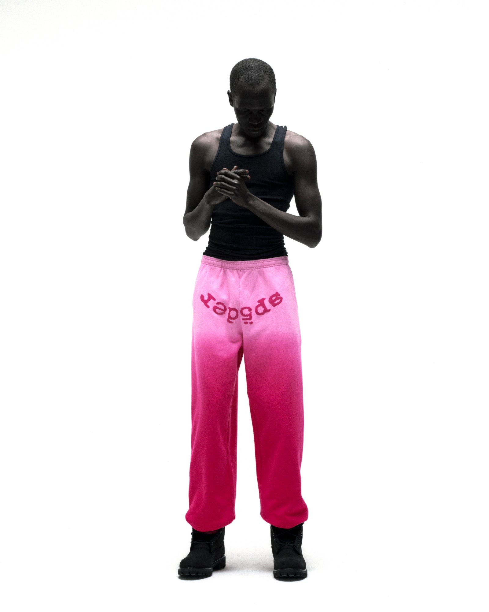 OG WEB OMBRE SWEATPANT: Pink ombre cotton fleece sweatpants with "SP5DER" text at crotch.