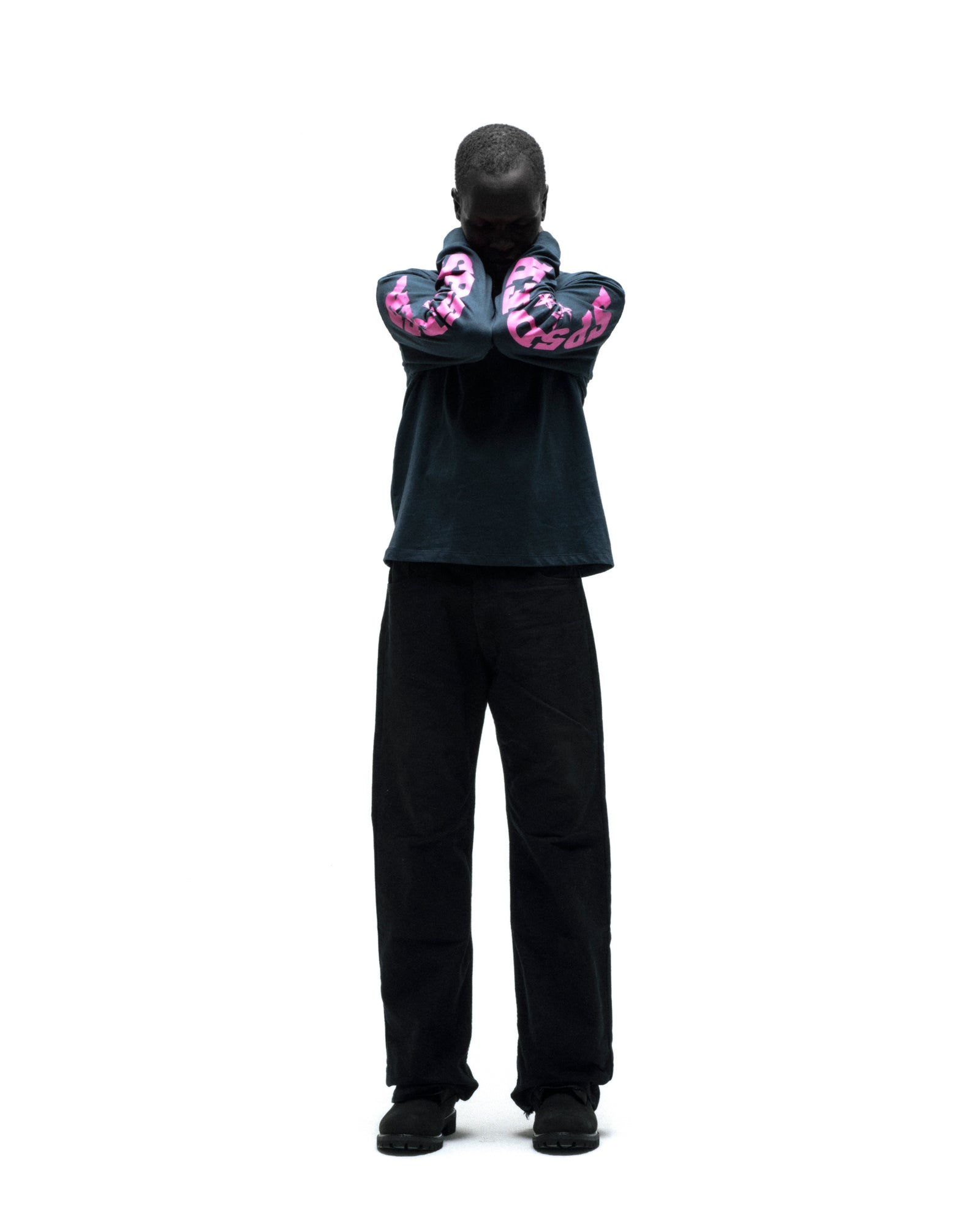 Black MX555 cotton long sleeve tee with pink graphic print on sleeves, ribbed collar and cuffs.