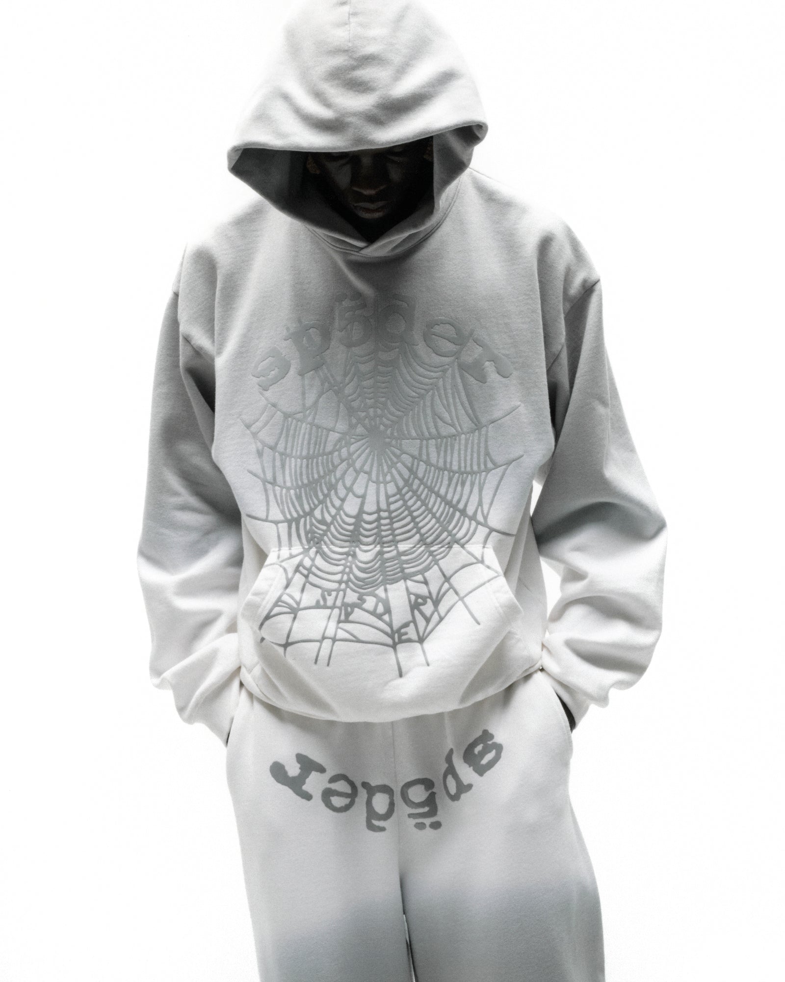 White 13oz cotton fleece OG Web Ombre Hoodie with puff print spiderweb design and matching sweatpants.