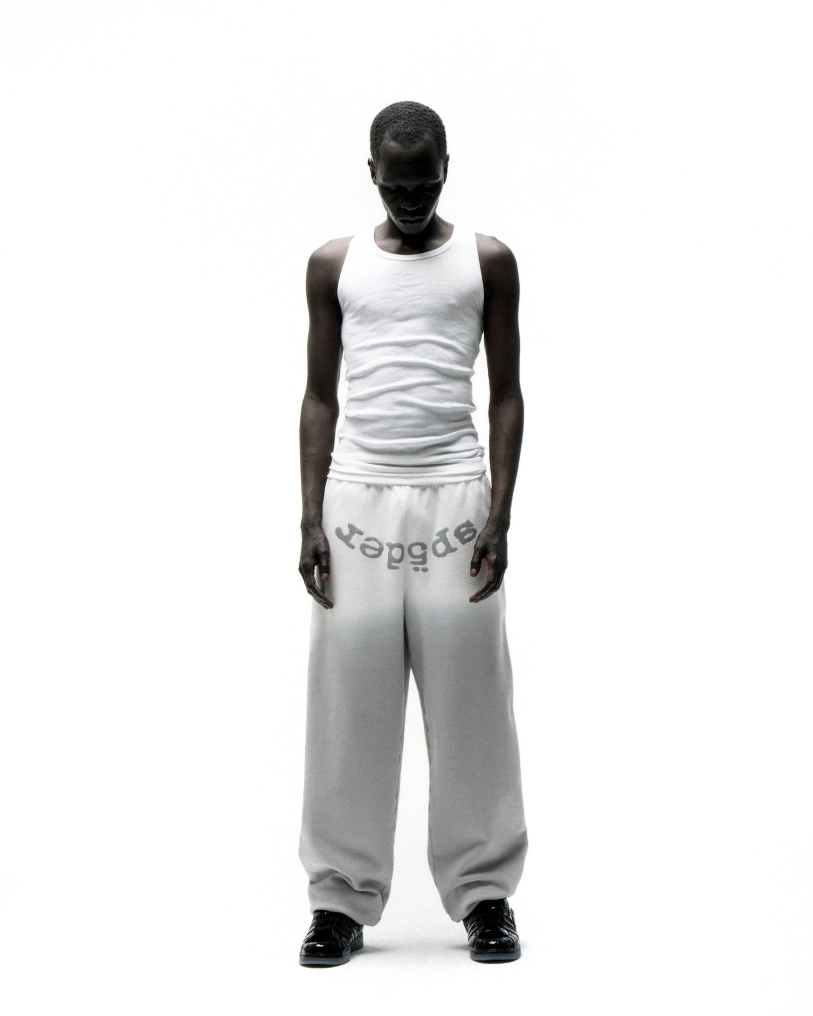 OG WEB OMBRE SWEATPANT: Light grey 100% cotton fleece sweatpants with "SP5DER" text at crotch.