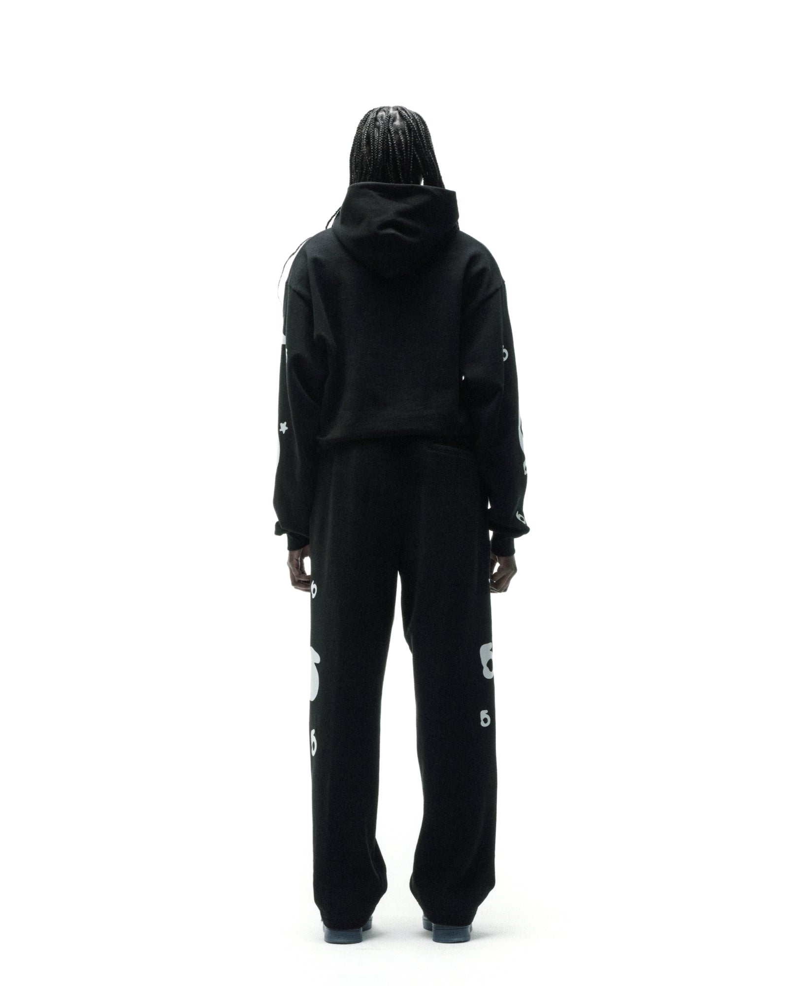 Black 13oz cotton fleece sweatpant with reflective 3M '5' and star designs.