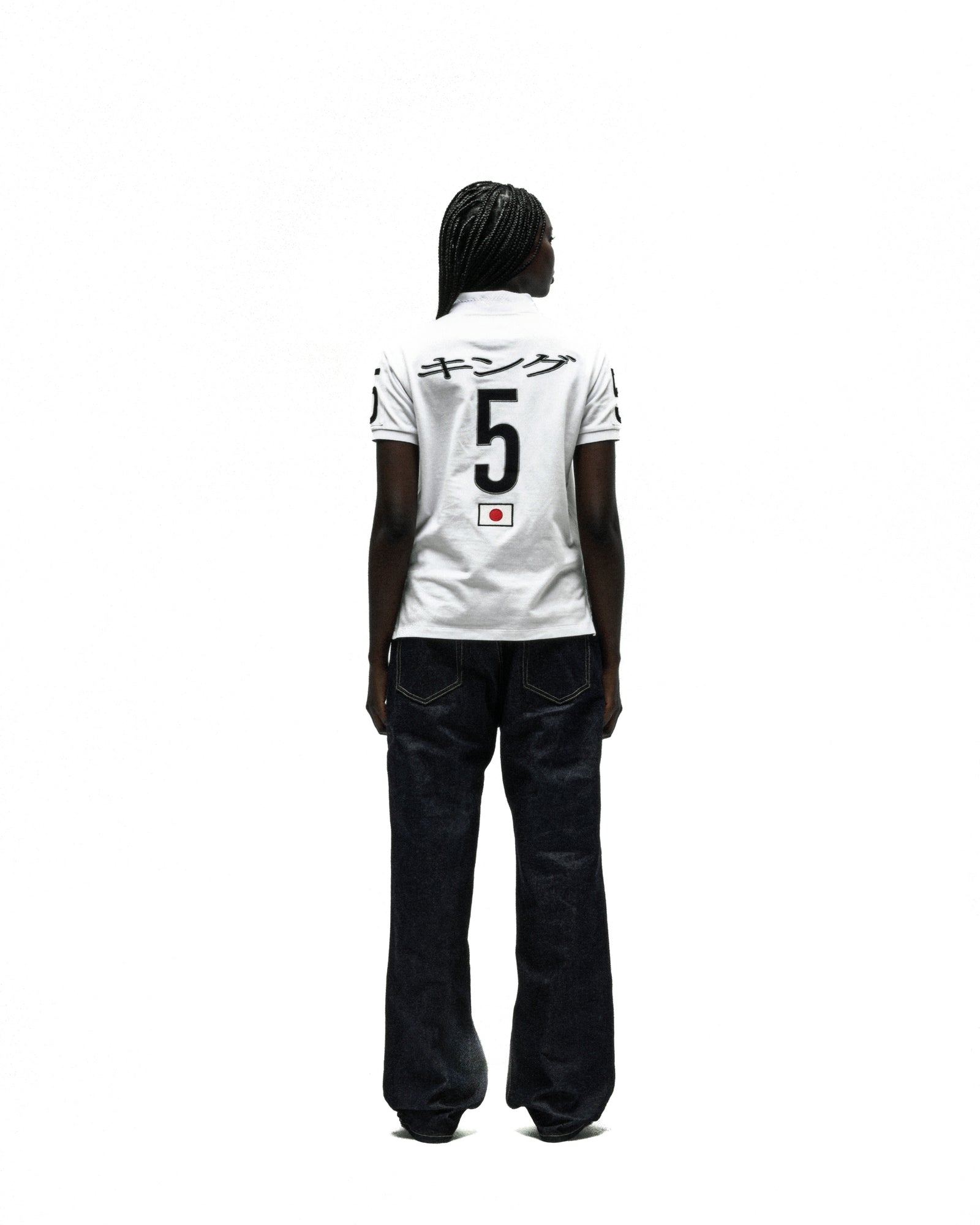 White polo shirt with black Japanese text, large "5", and a Japanese flag emblem on the back.