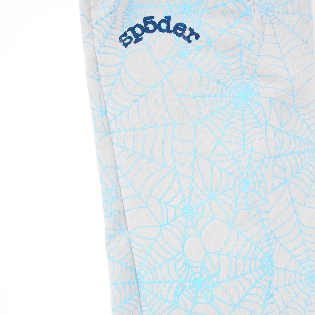 Light gray fleece sweatpant with all-over cracked blue web print and "sp5der" text on upper leg.