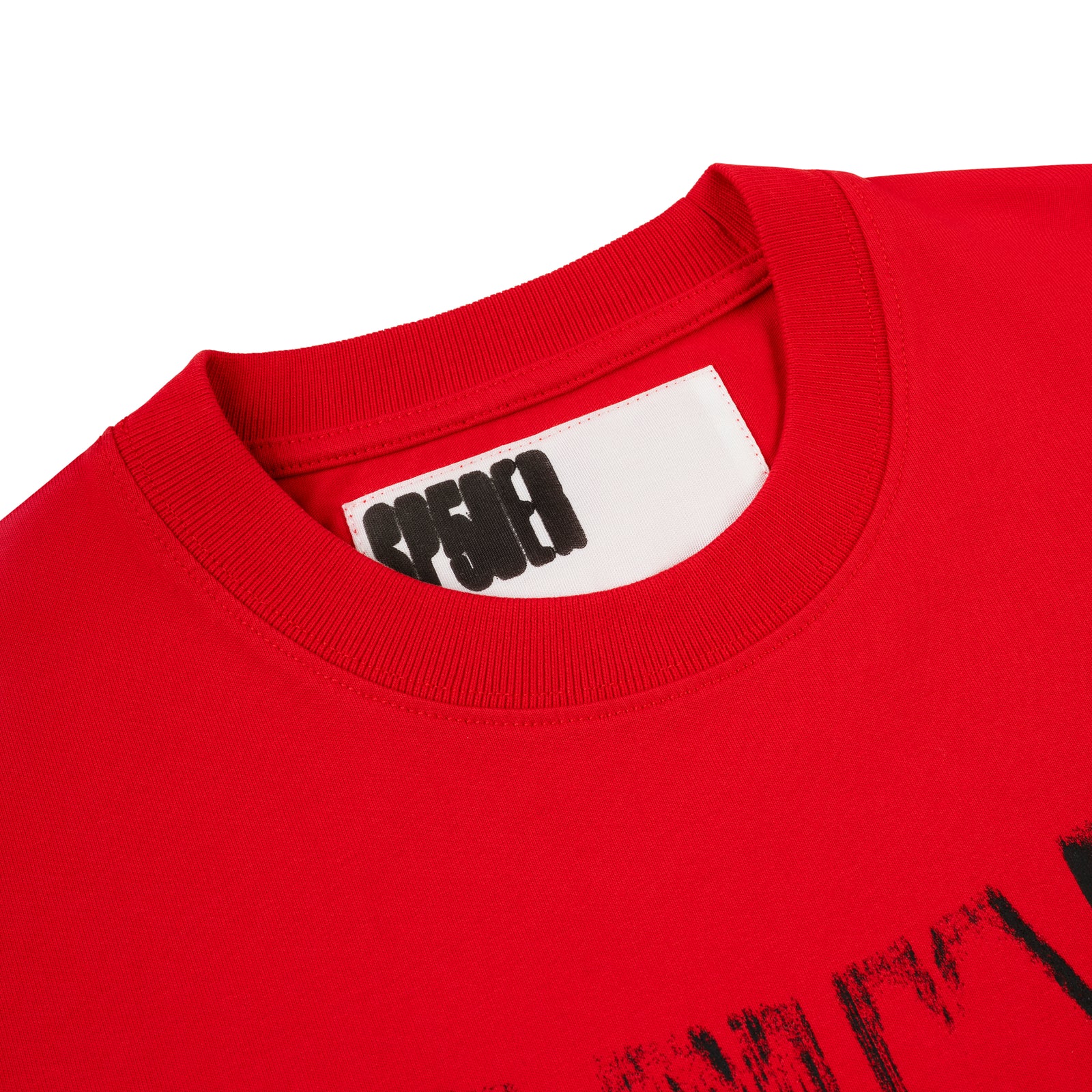 Red 100% cotton tee with ribbed crew neck and black 'SP5DER' logo on white back neck label.