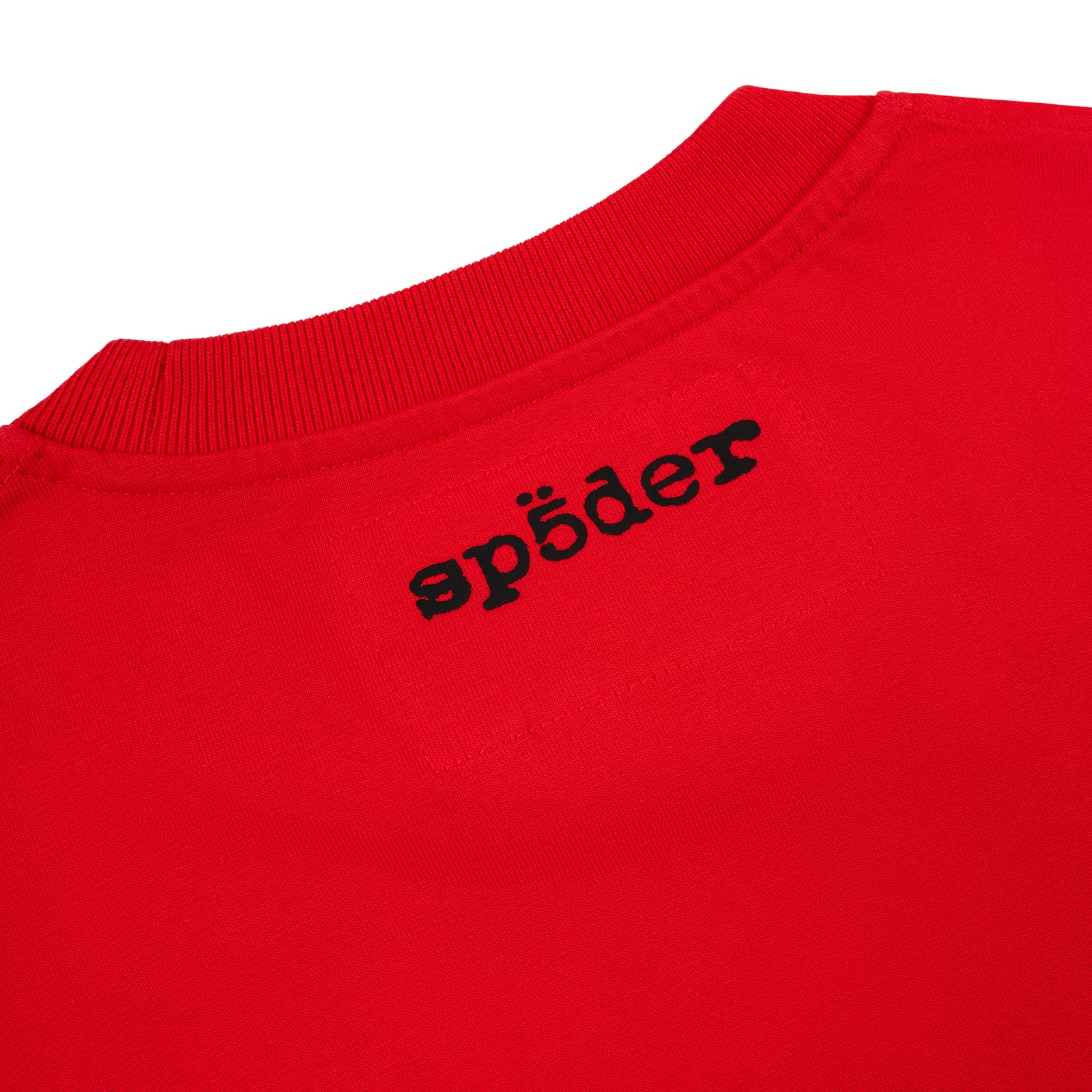 Red cotton tee with black 'sp5der' logo on the back neck.
