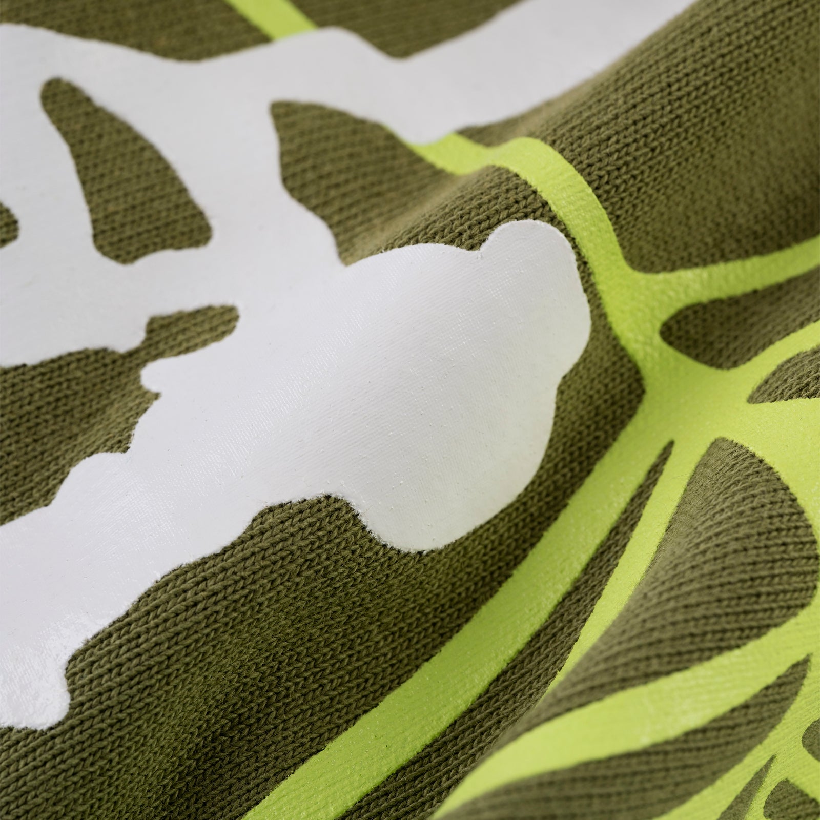 Olive green cotton fleece hoodie with white puff print stars and lime green web print.