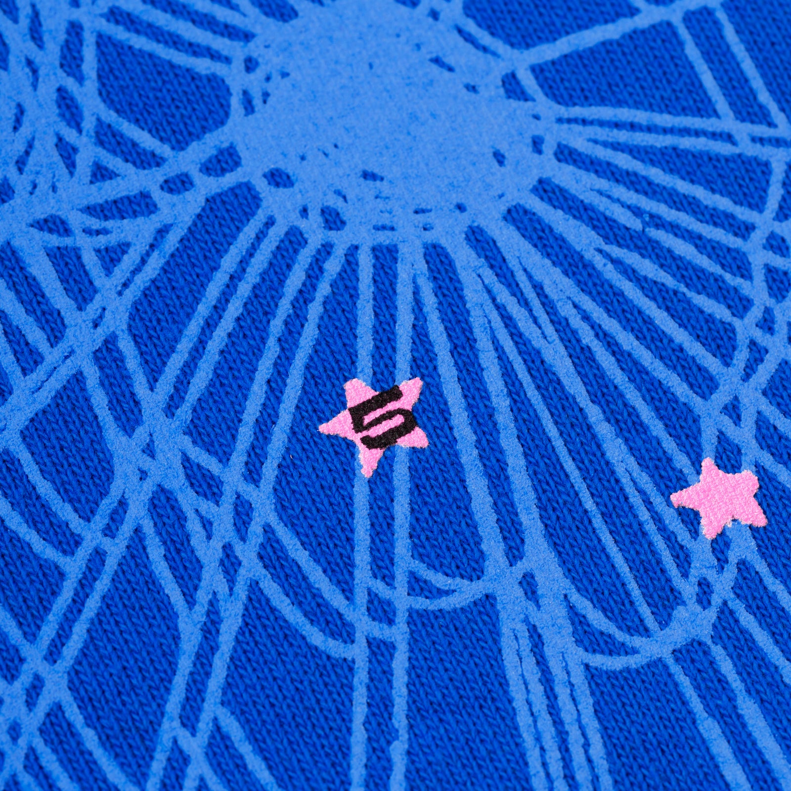 Blue fleece hoodie with '555' angel numbers, OG web, and scattered pink star puff prints.