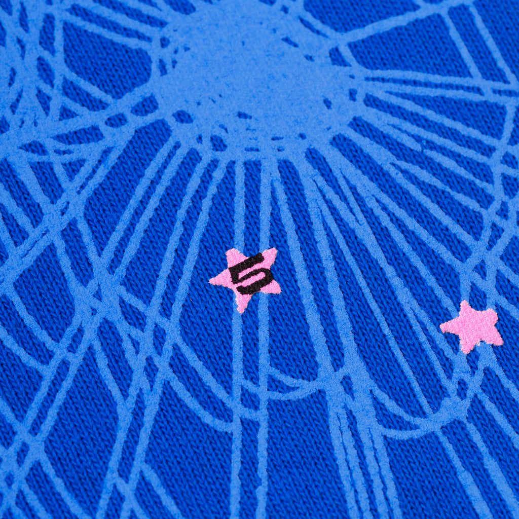 Blue fleece hoodie with '555' angel numbers, OG web, and scattered pink star puff prints.