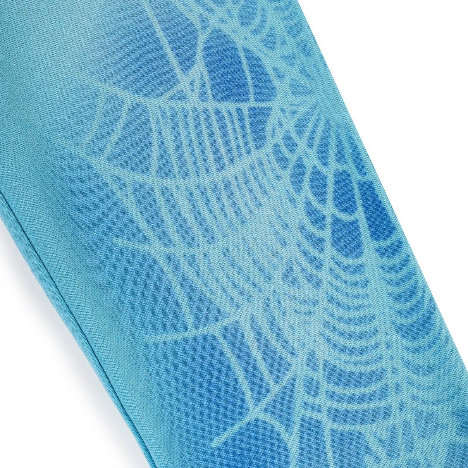 OG WEB V2 SPRAY SWEATPANT, light blue cotton fleece with subtle spray web design.