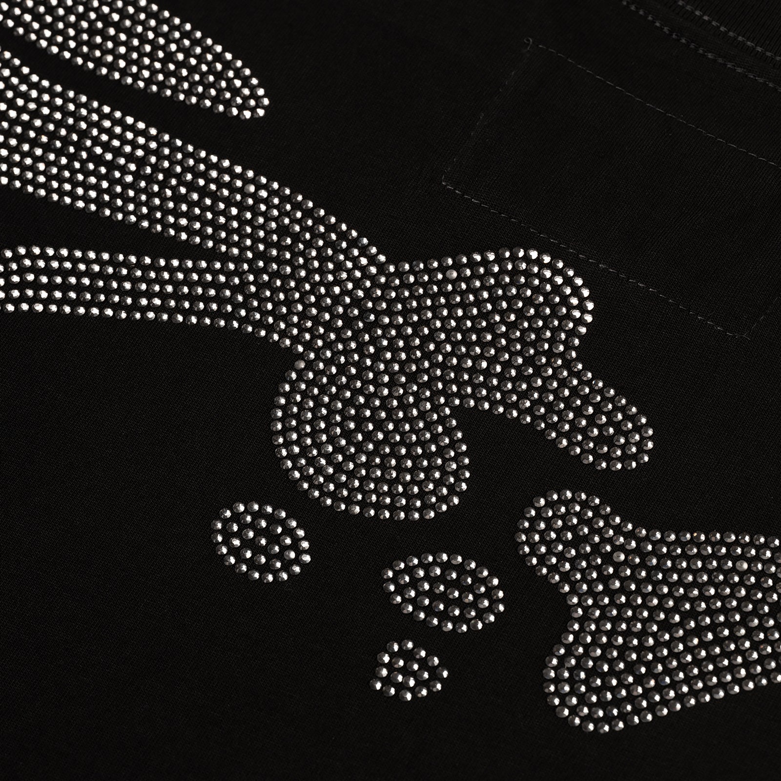 Black cotton tee with a sparkling silver rhinestone graphic design.