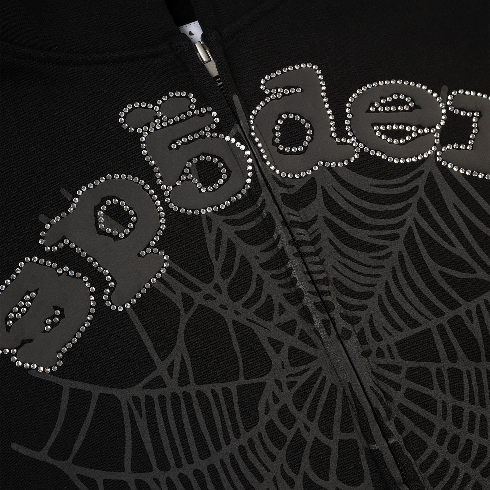 Black 13oz cotton fleece zip-up with rhinestone "OG WEB" text and spiderweb graphic.