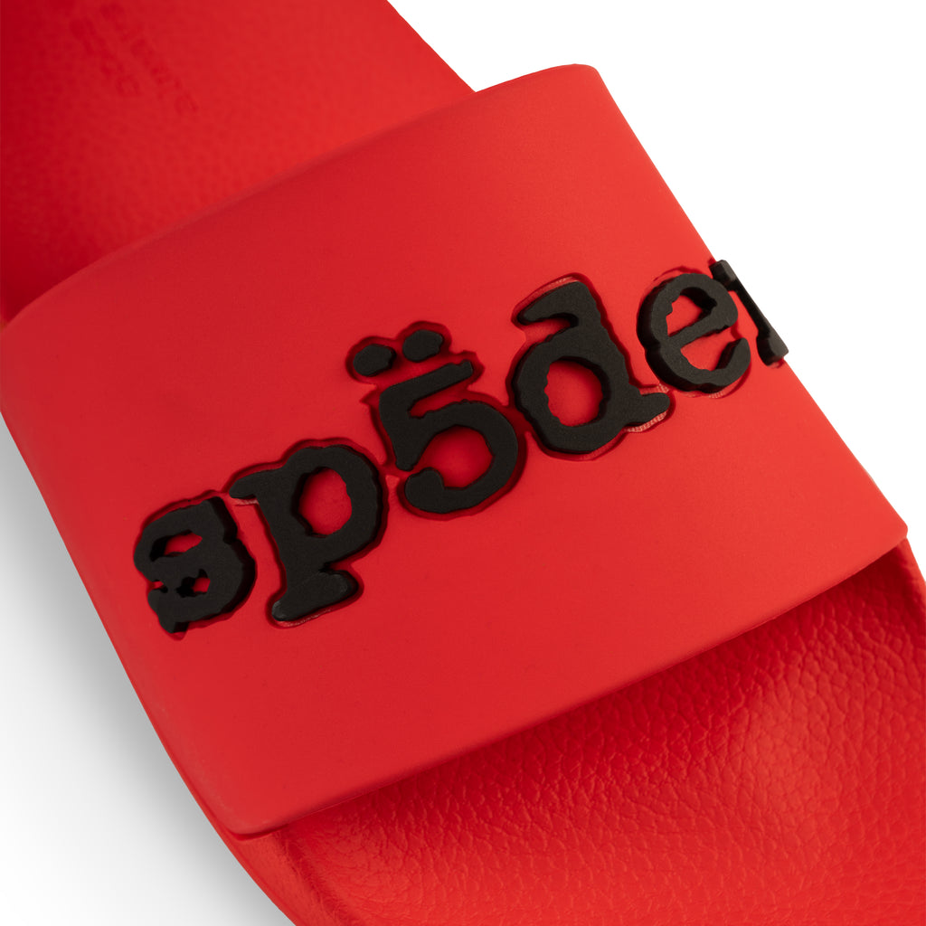 Red ENZO SLIDE 001 with black "sp5der" logo on vamp, molded rubber footbed.