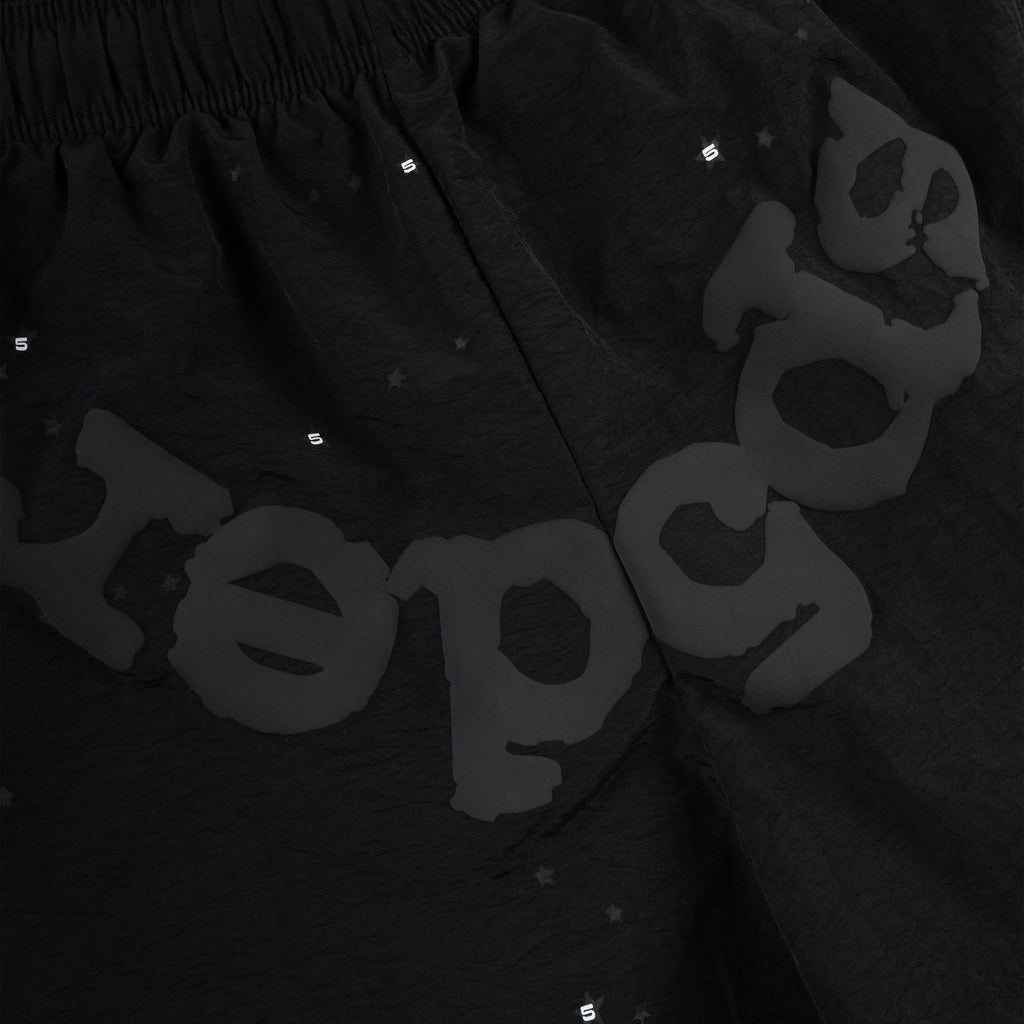 Black OG WEB Double Layer Short with subtle star print and "sp5der" text.
